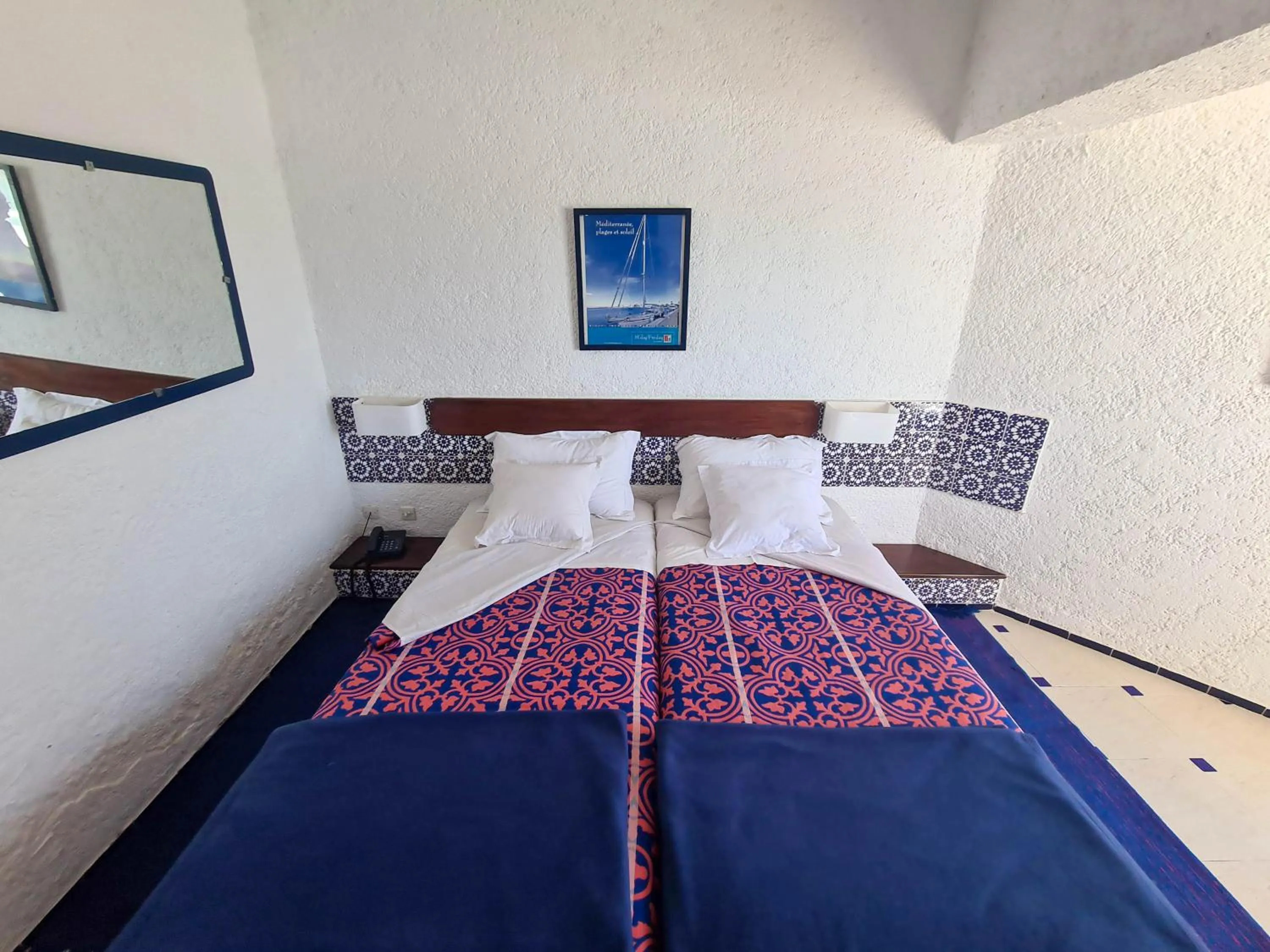 Bed in UMH Tarik Hotel