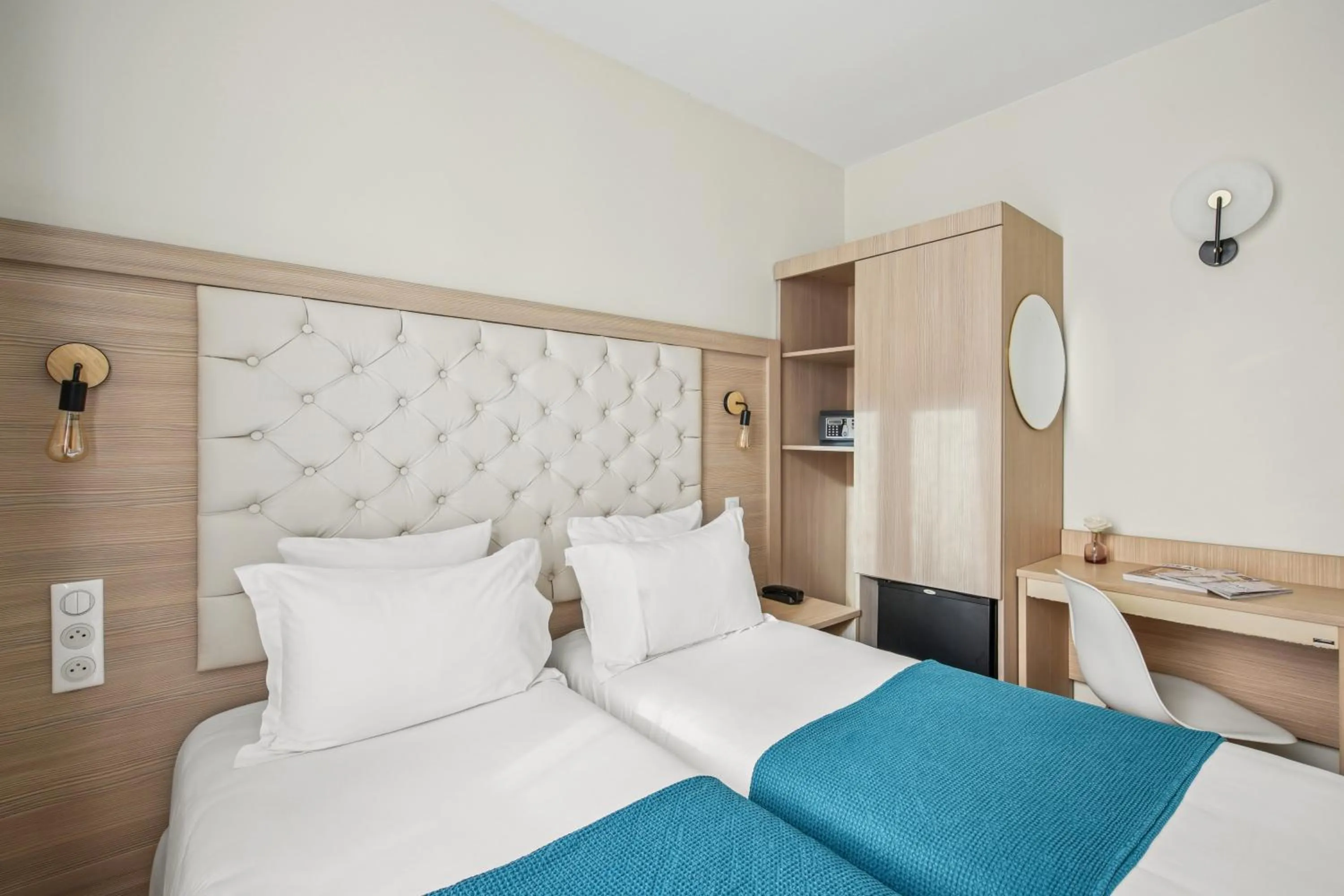 Bed in Hôtel Alexandrine Opera