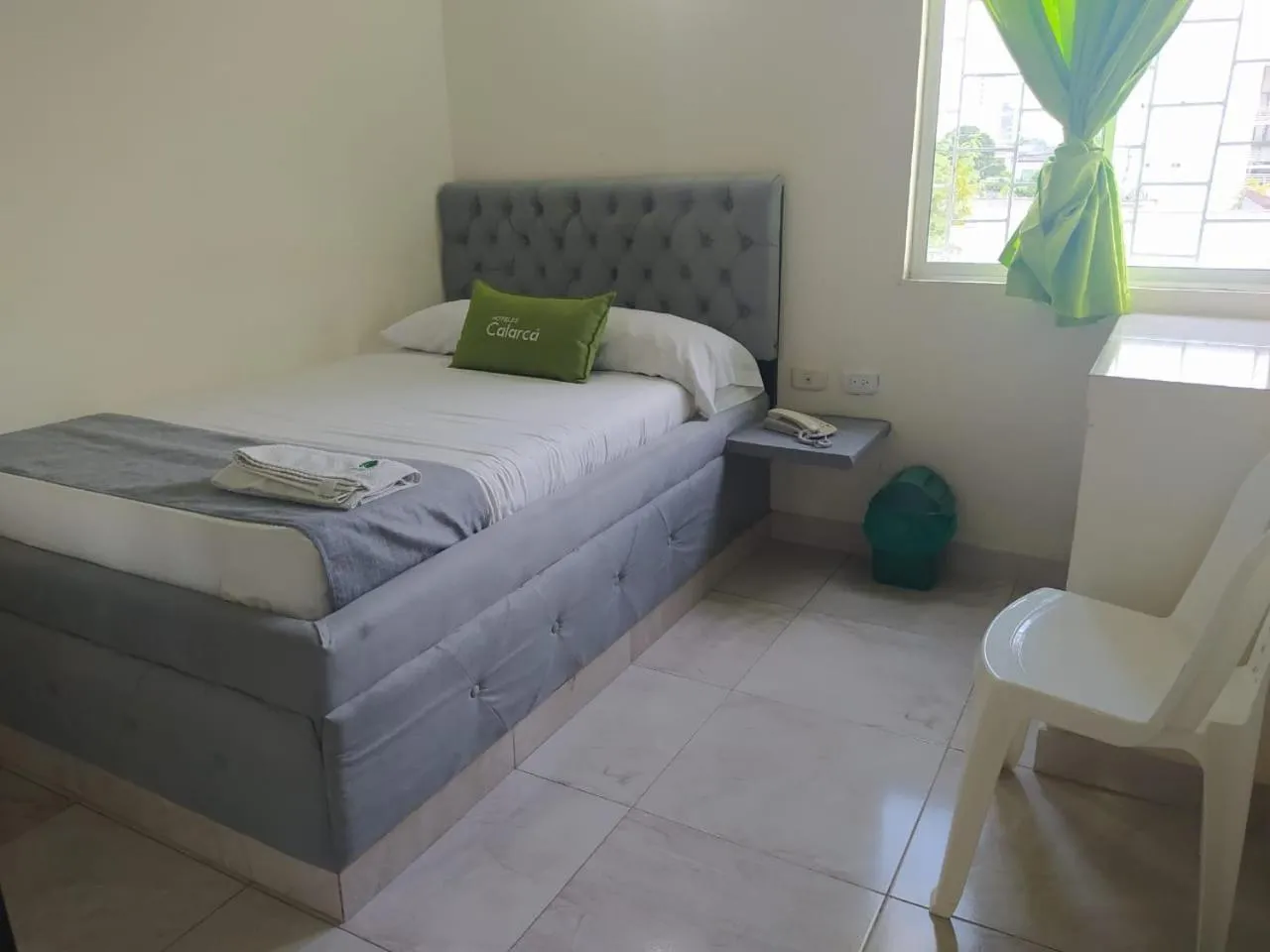 Bed in Hotel Calarca N1