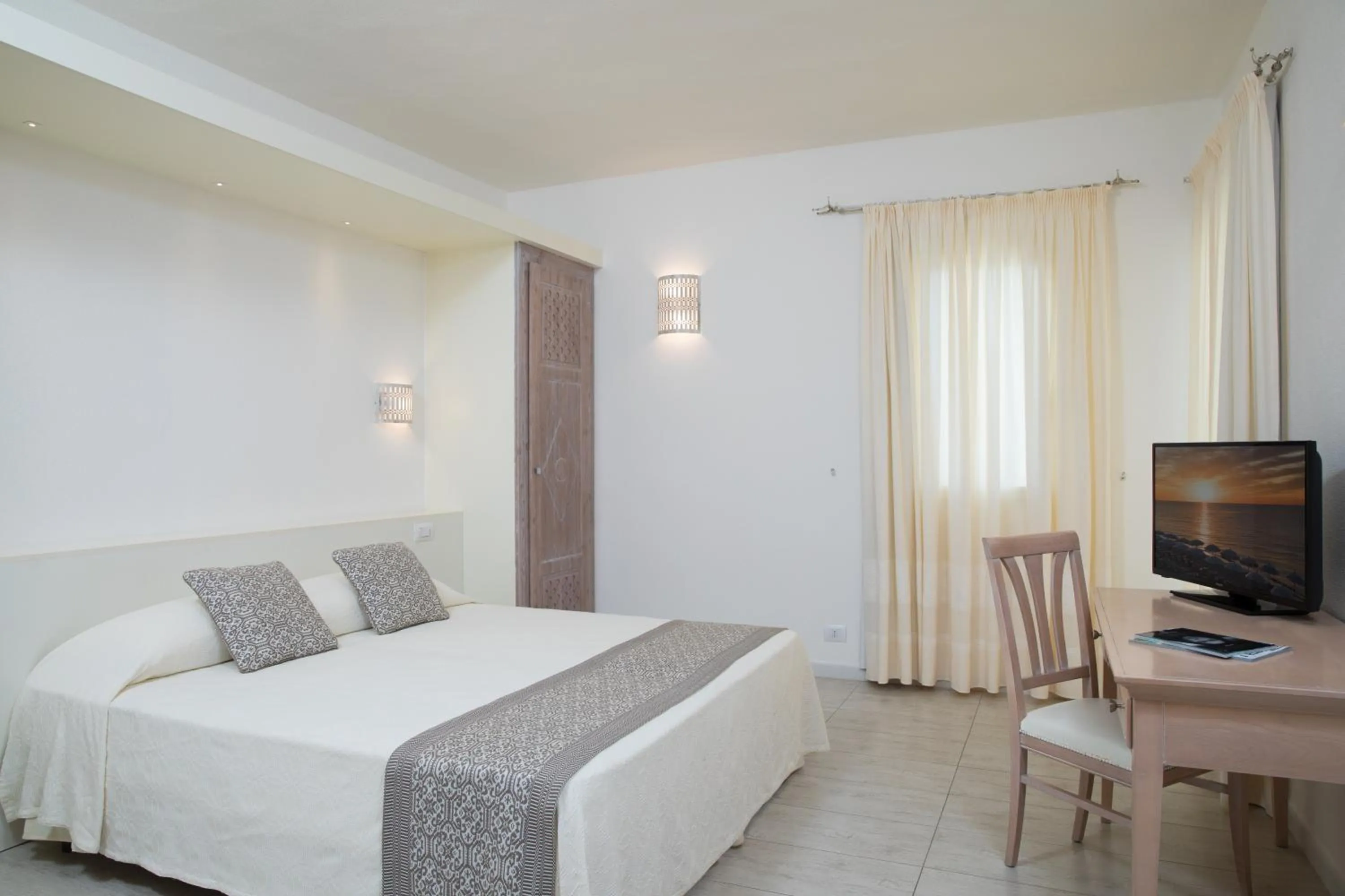 Bed in Hotel Flamingo