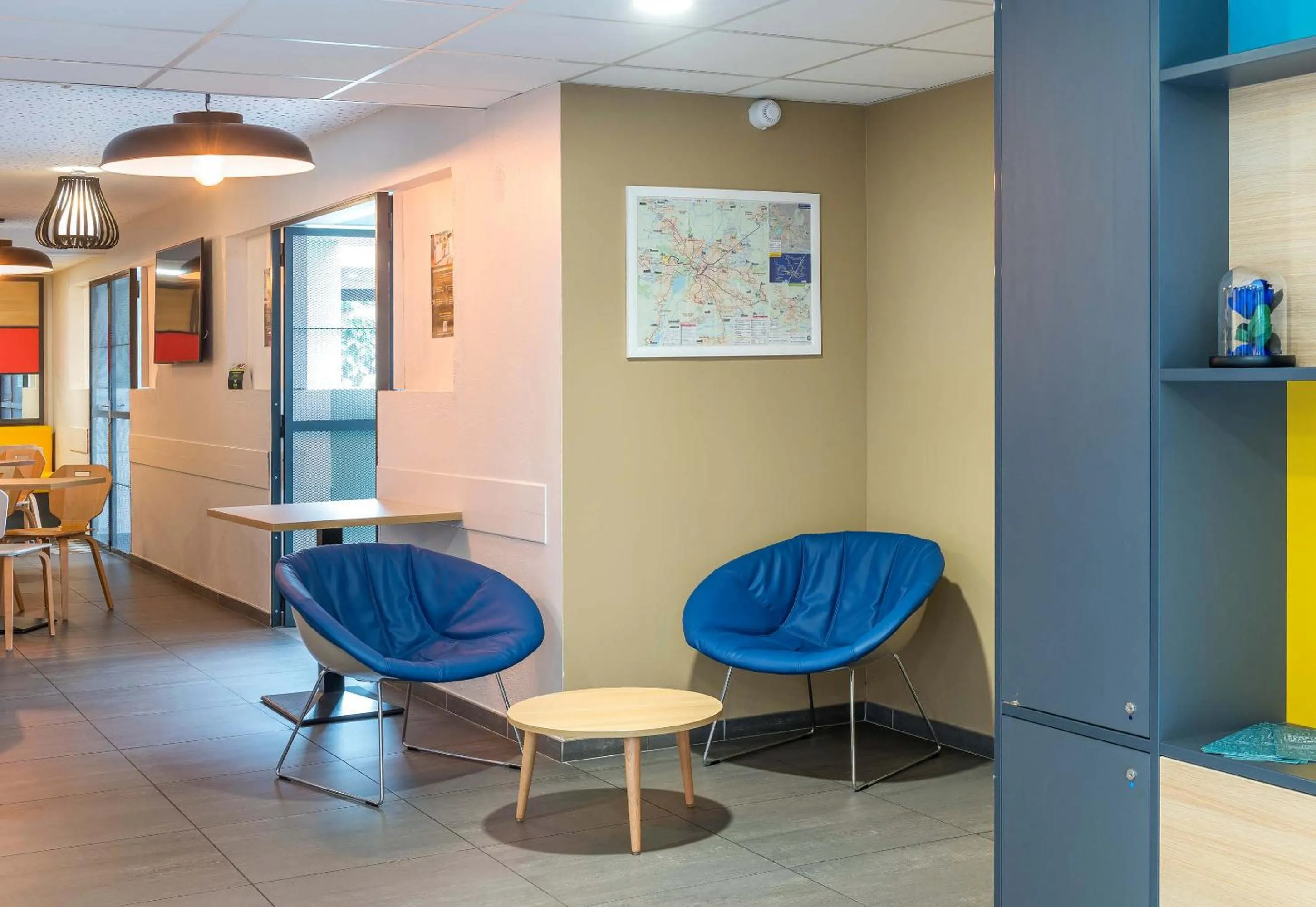 Seating area in B&B HOTEL Angers Parc Expos