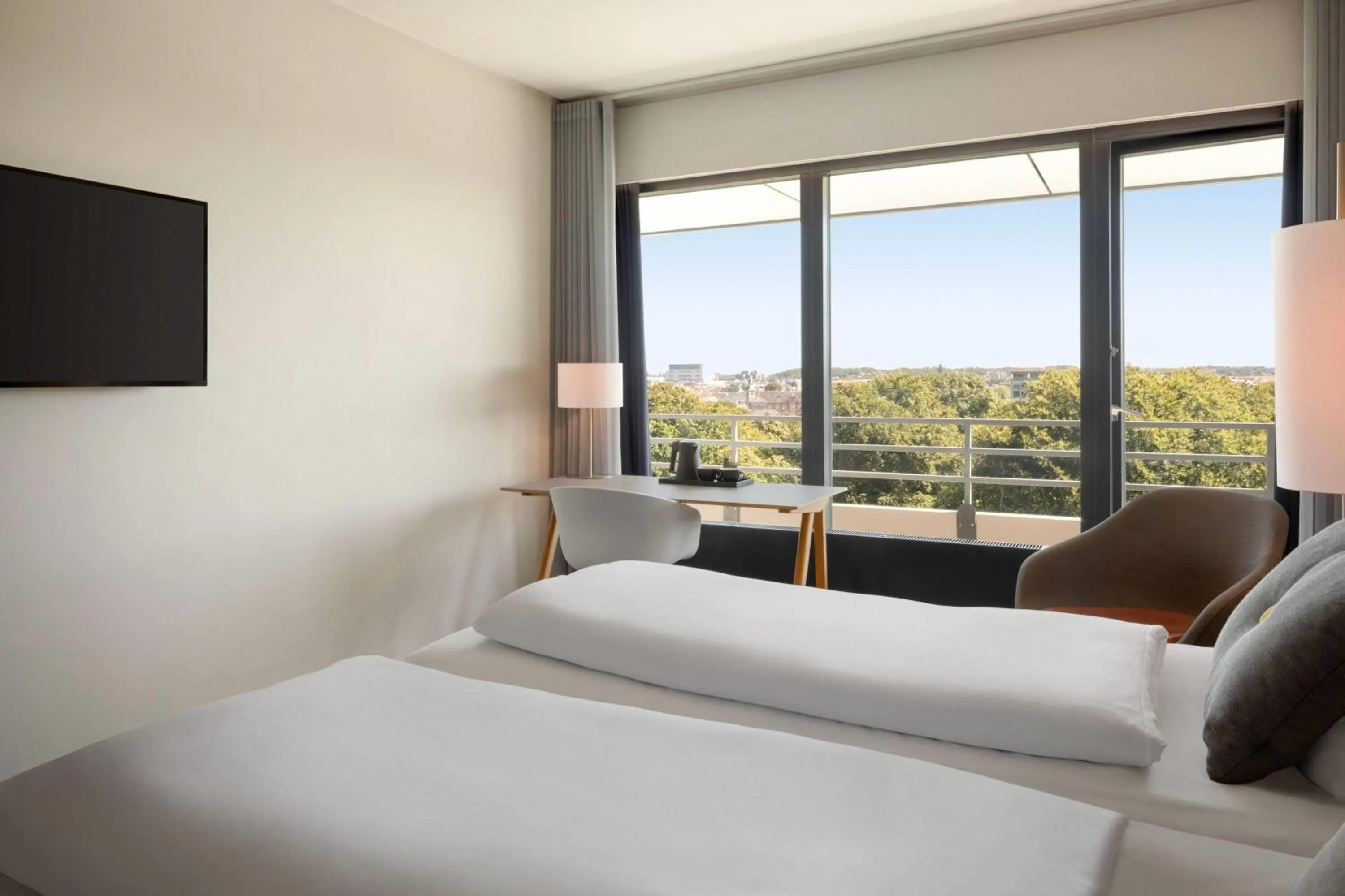 Photo of the whole room, Bed in Comwell Hvide Hus Aalborg, Dolce by Wyndham