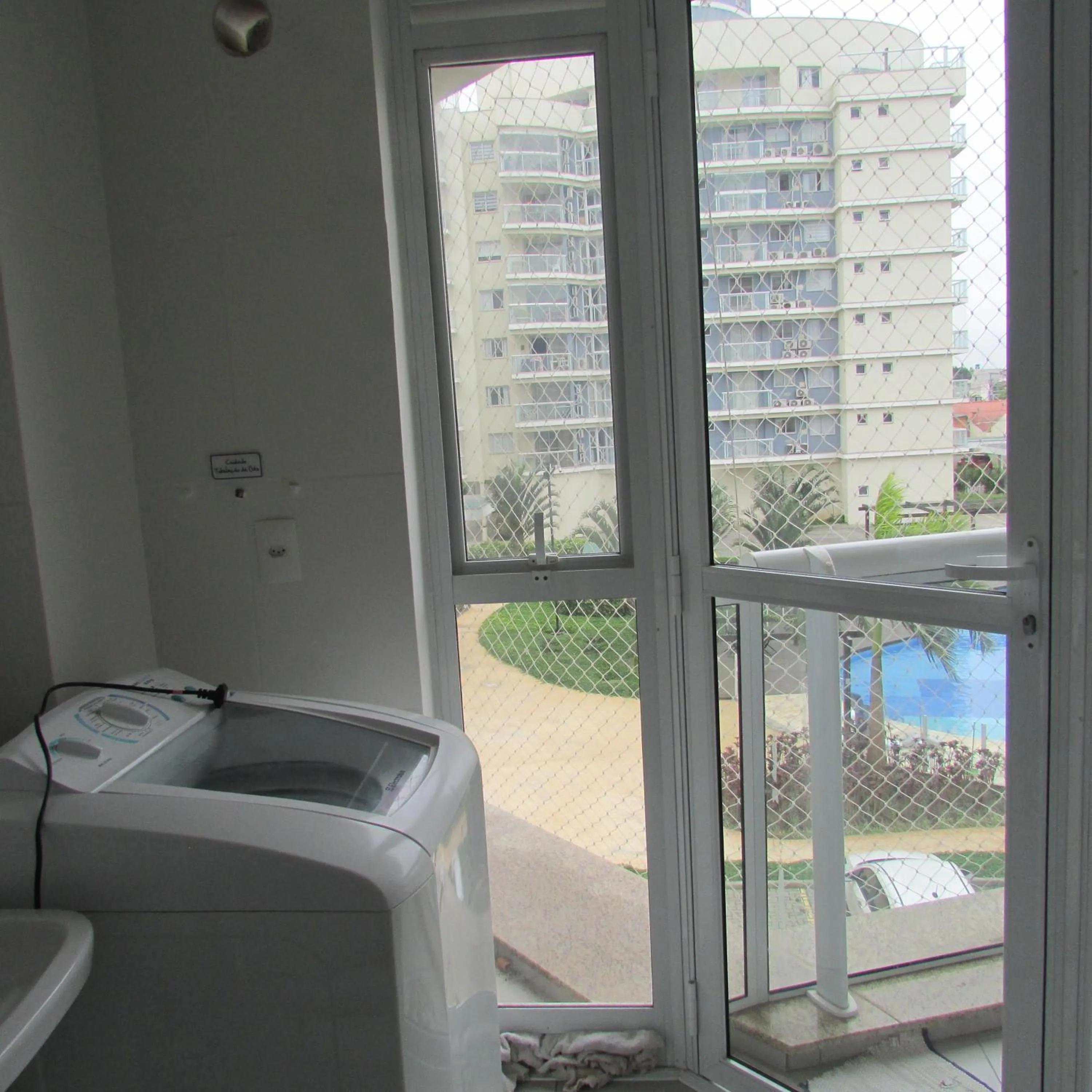 laundry, Bed in Apartamento em Condominio na Penha