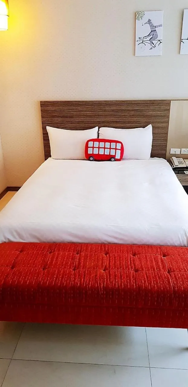 Bed in Esun Villa Hotel