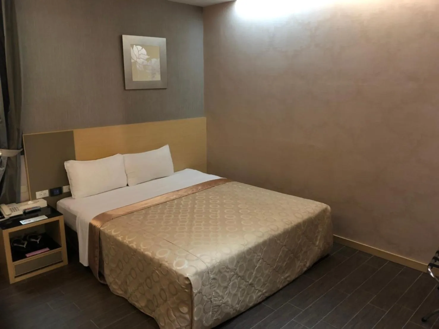 Bed in Esun Villa Hotel