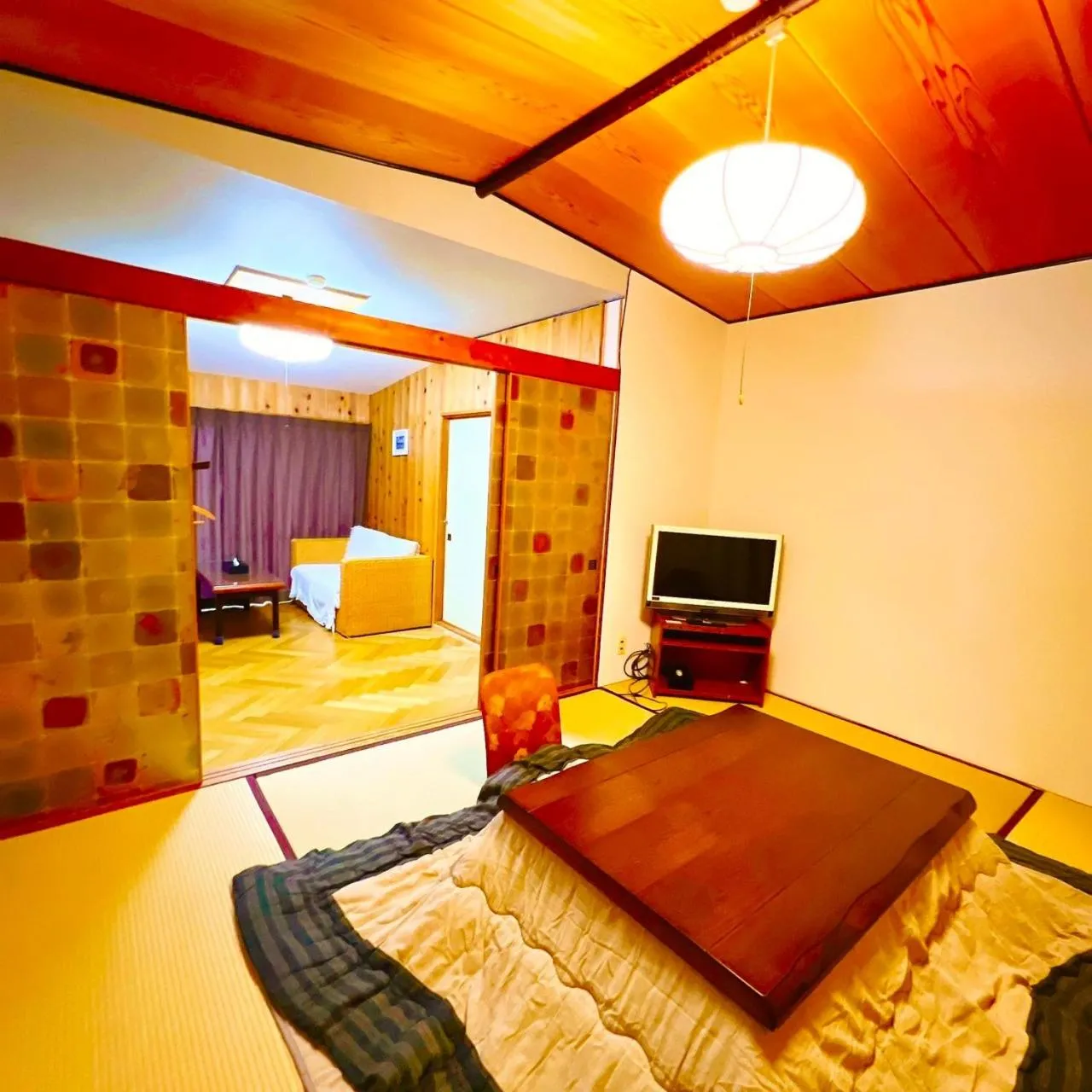 Living room, Bed in Japanese style hotel and dining Morigen
