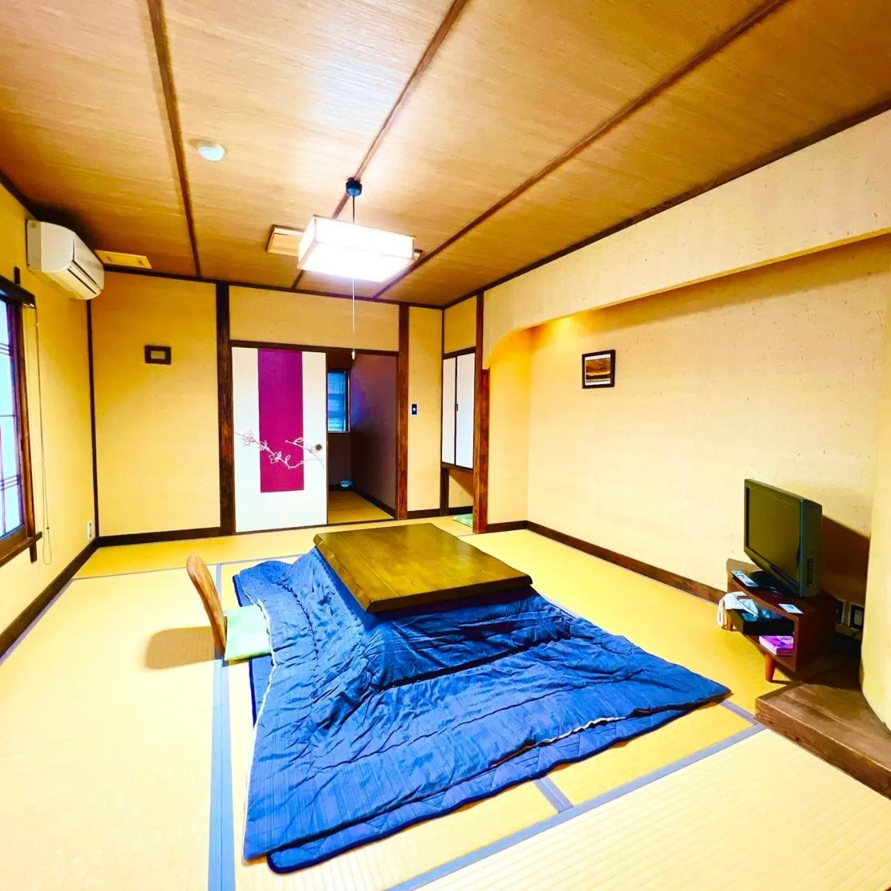 Living room, Bed in Japanese style hotel and dining Morigen