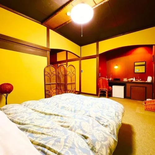 Bedroom, Bed in Japanese style hotel and dining Morigen