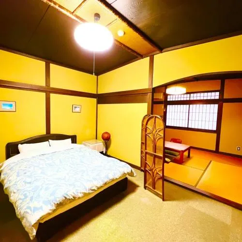 Bed in Japanese style hotel and dining Morigen