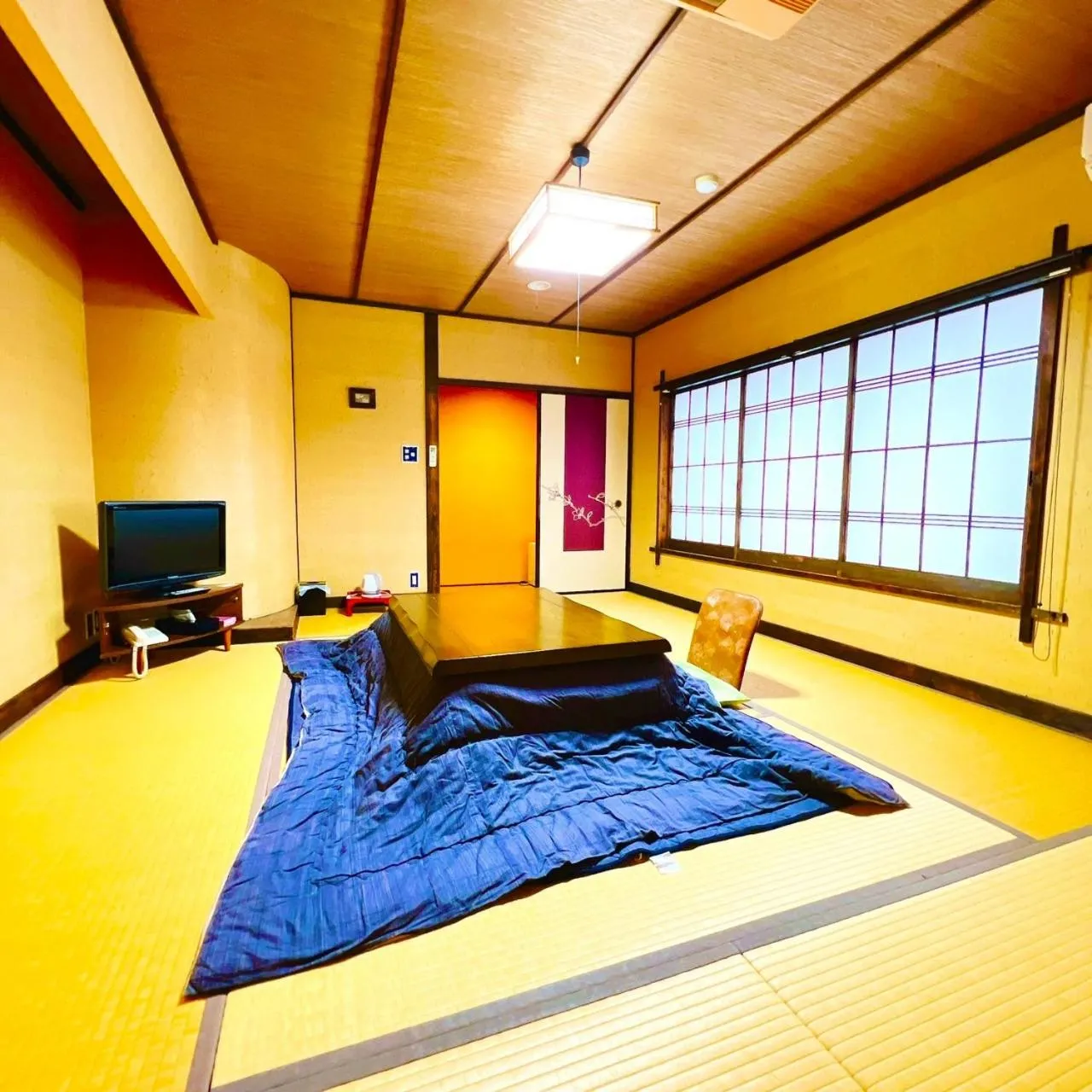 Living room, Bed in Japanese style hotel and dining Morigen