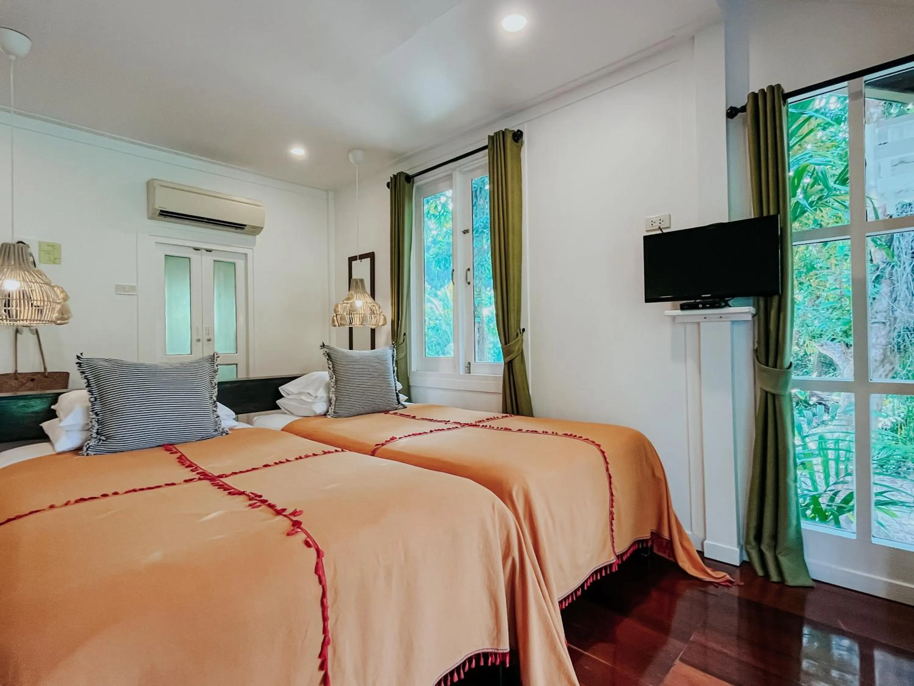 Bed in Baan Bua Cottage