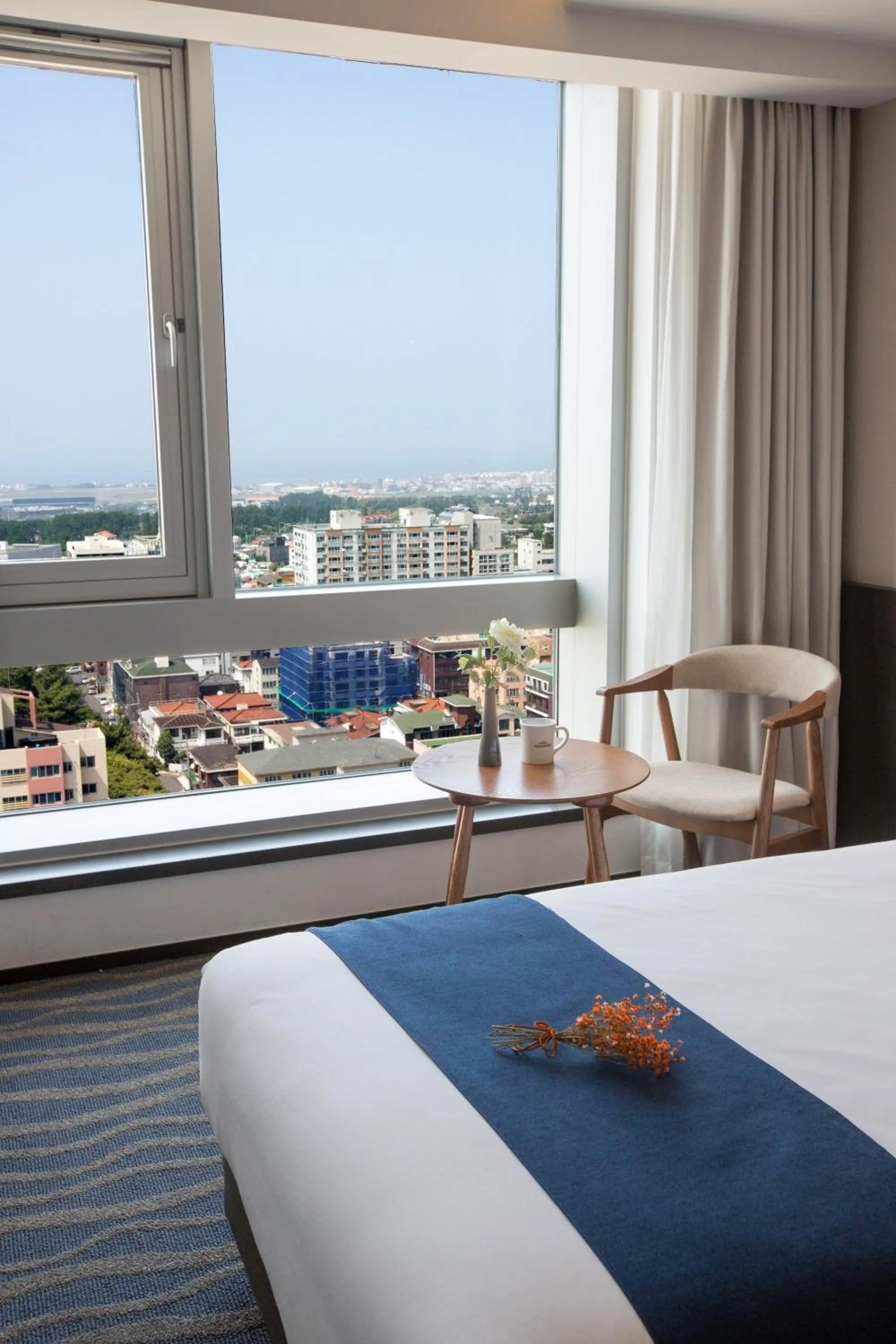 Bed in Gloucester Hotel Jeju