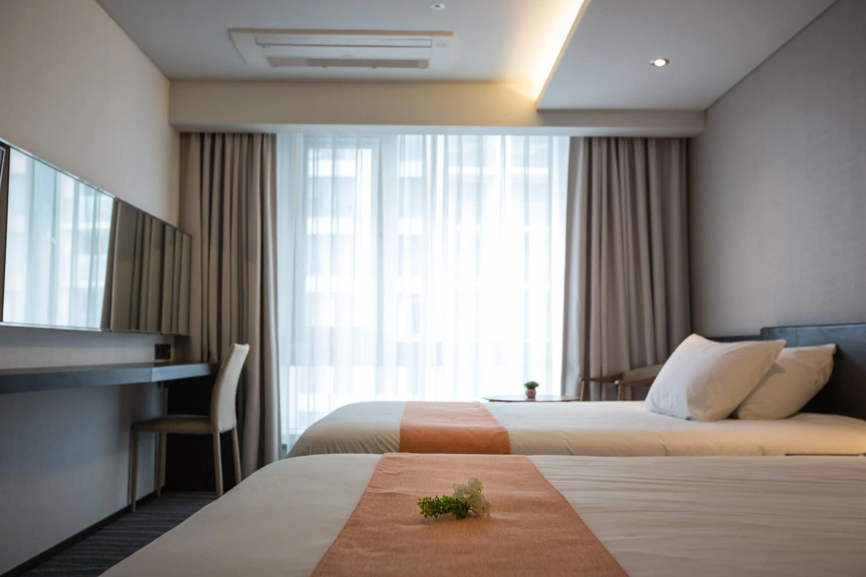 Bed in Gloucester Hotel Jeju