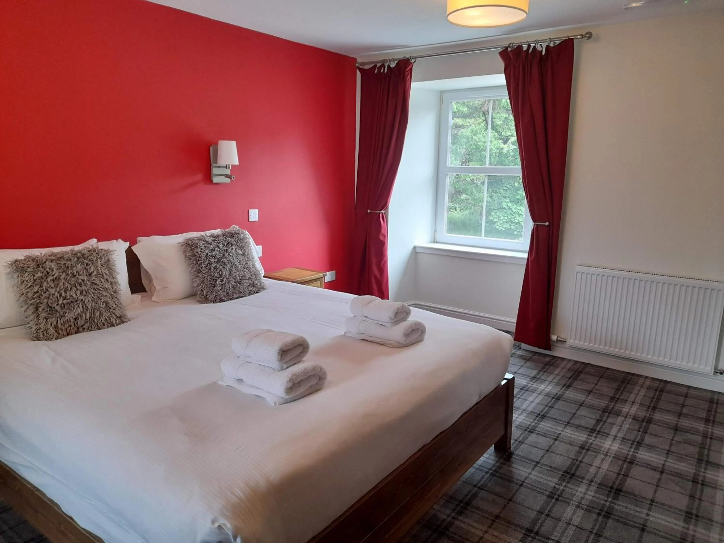 Bed in The Rowan Tree Country Hotel