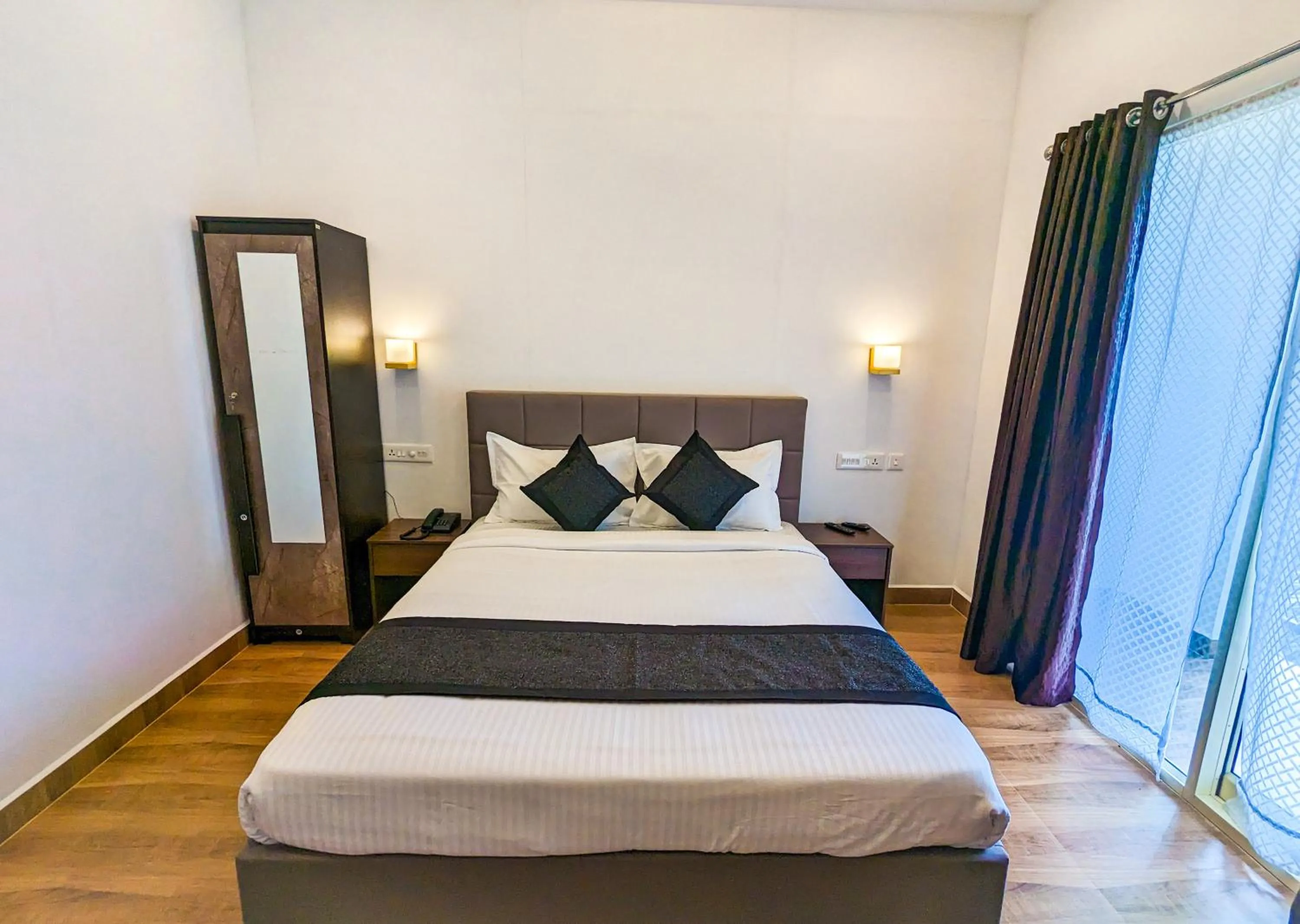 Photo of the whole room, Bed in Ayursakthi Riverdale