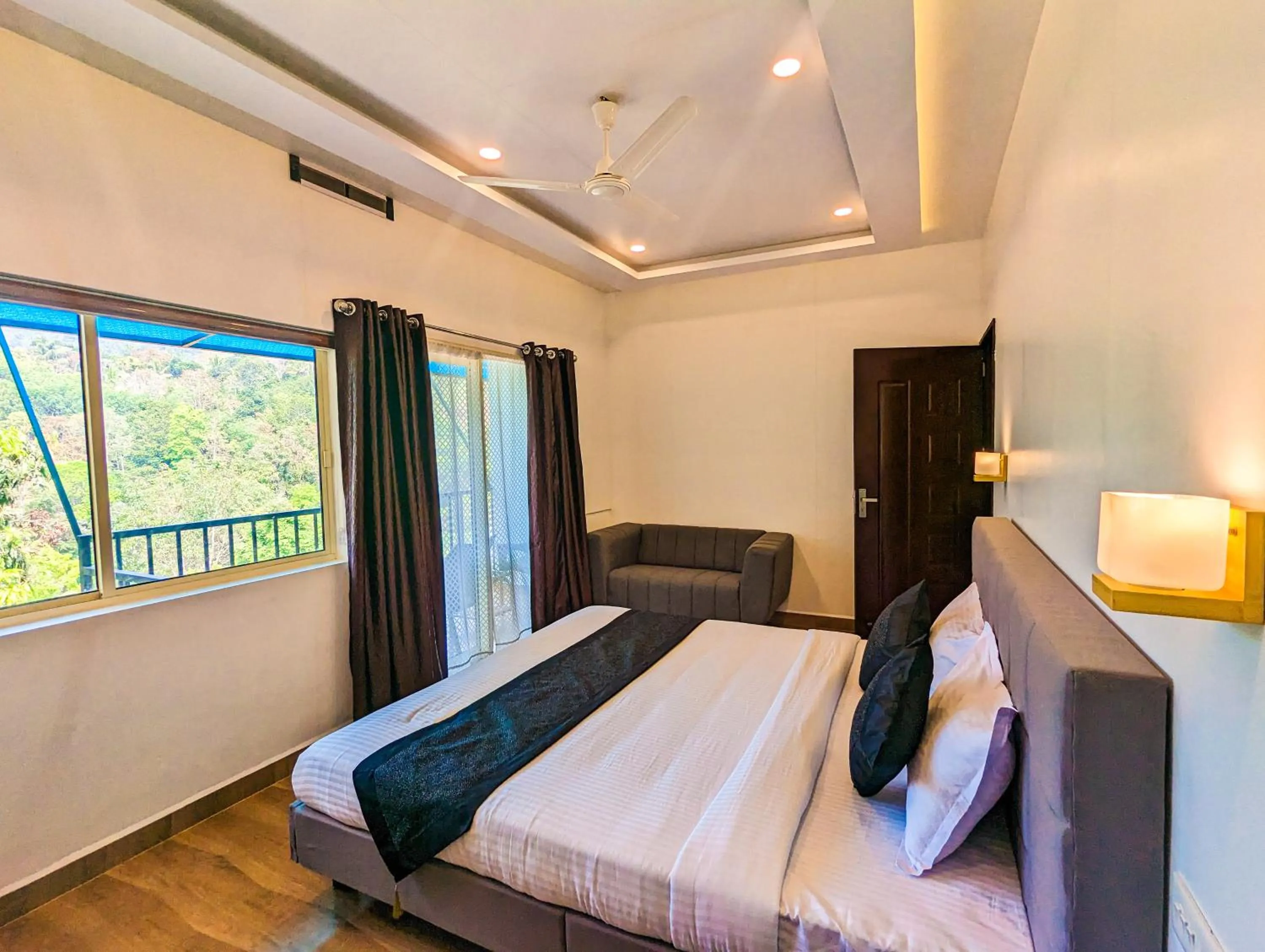 Photo of the whole room, Bed in Ayursakthi Riverdale