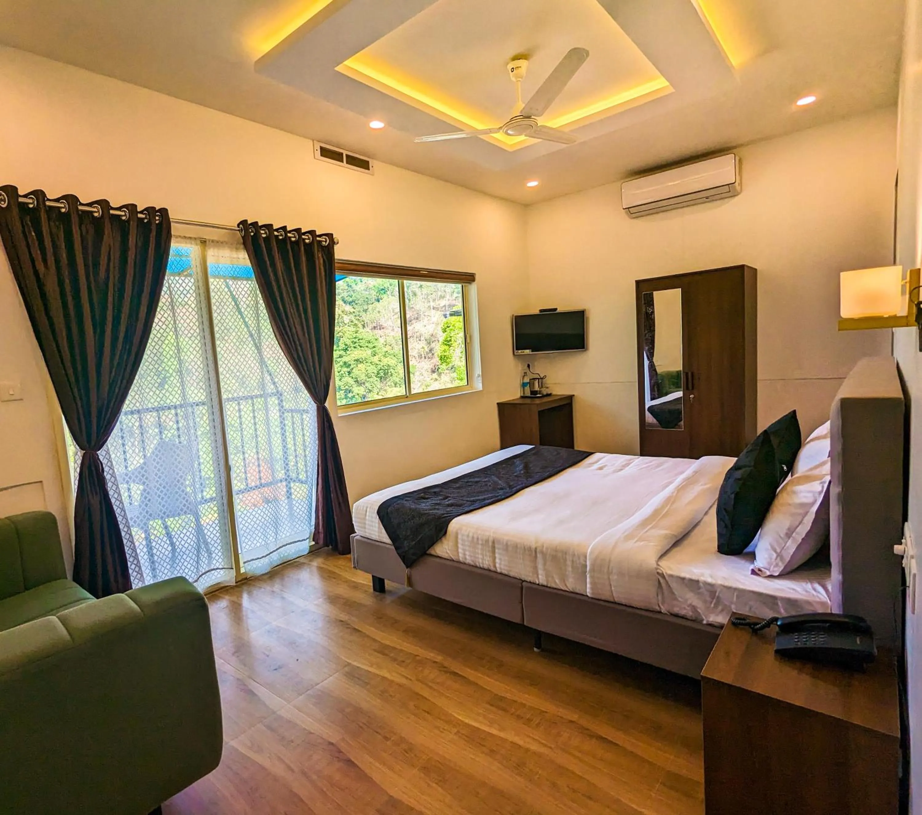 Photo of the whole room, Bed in Ayursakthi Riverdale