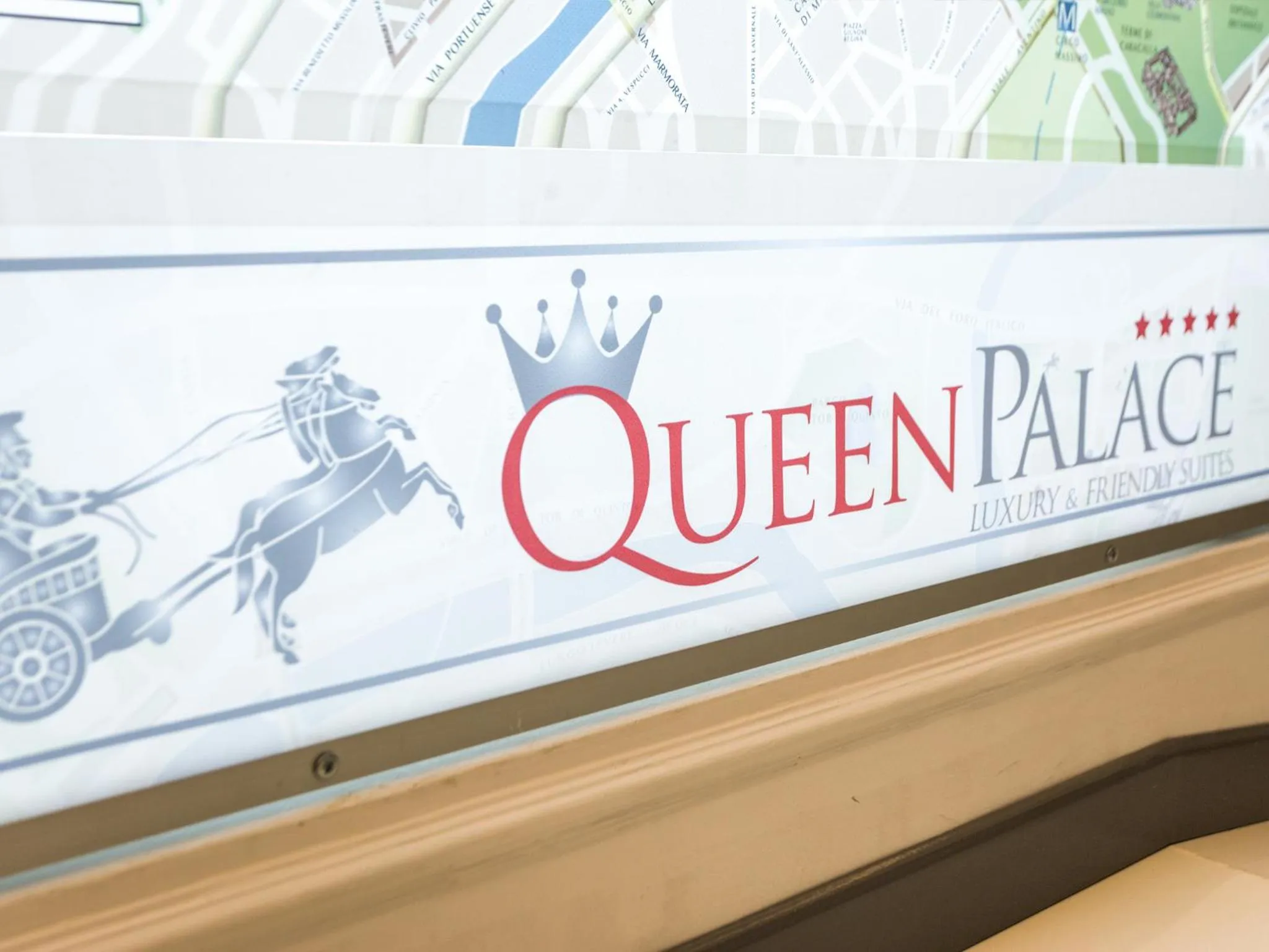 Property logo or sign in Queen Palace Suites