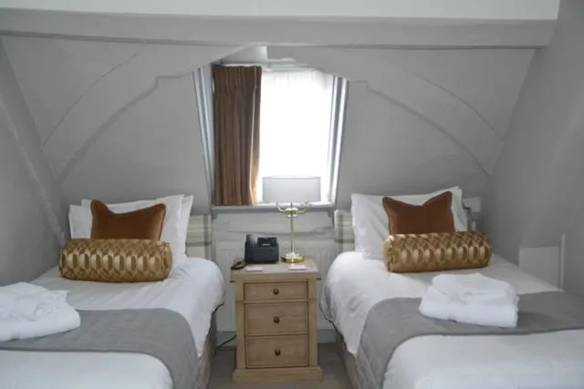 Bed in The Ancient Gatehouse & Rugantino Restaurant