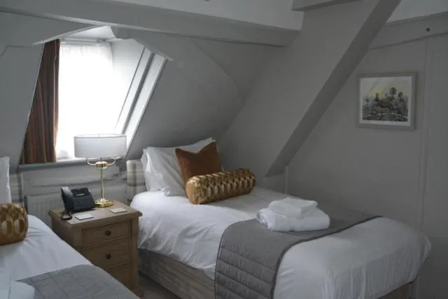 Bed in The Ancient Gatehouse & Rugantino Restaurant