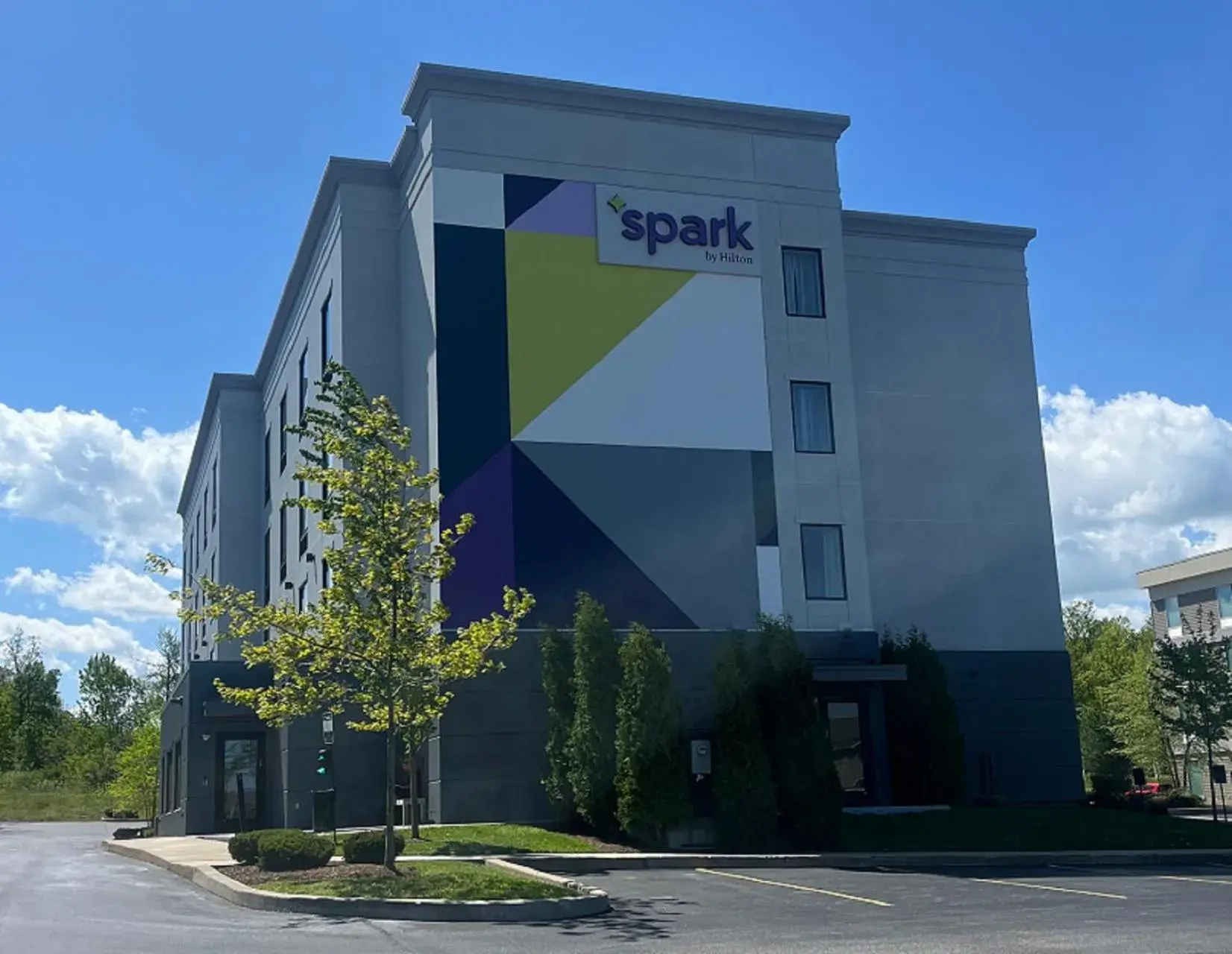 Property building in Spark by Hilton Erie Property building in Spark by Hilton Erie