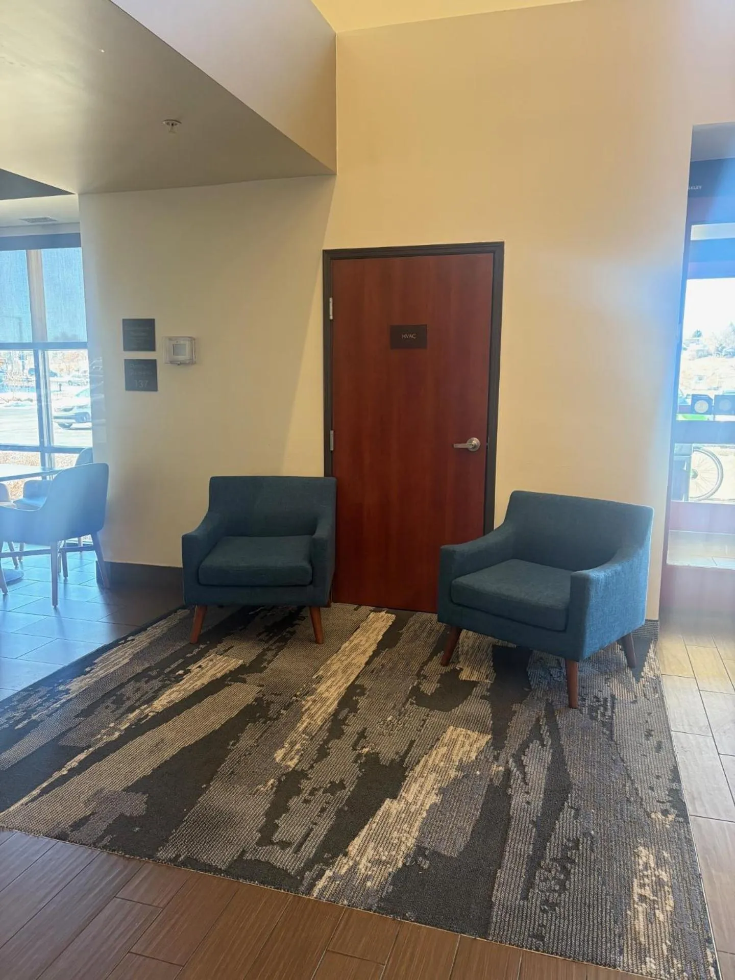 Seating area in MainStay Suites Near Denver Downtown