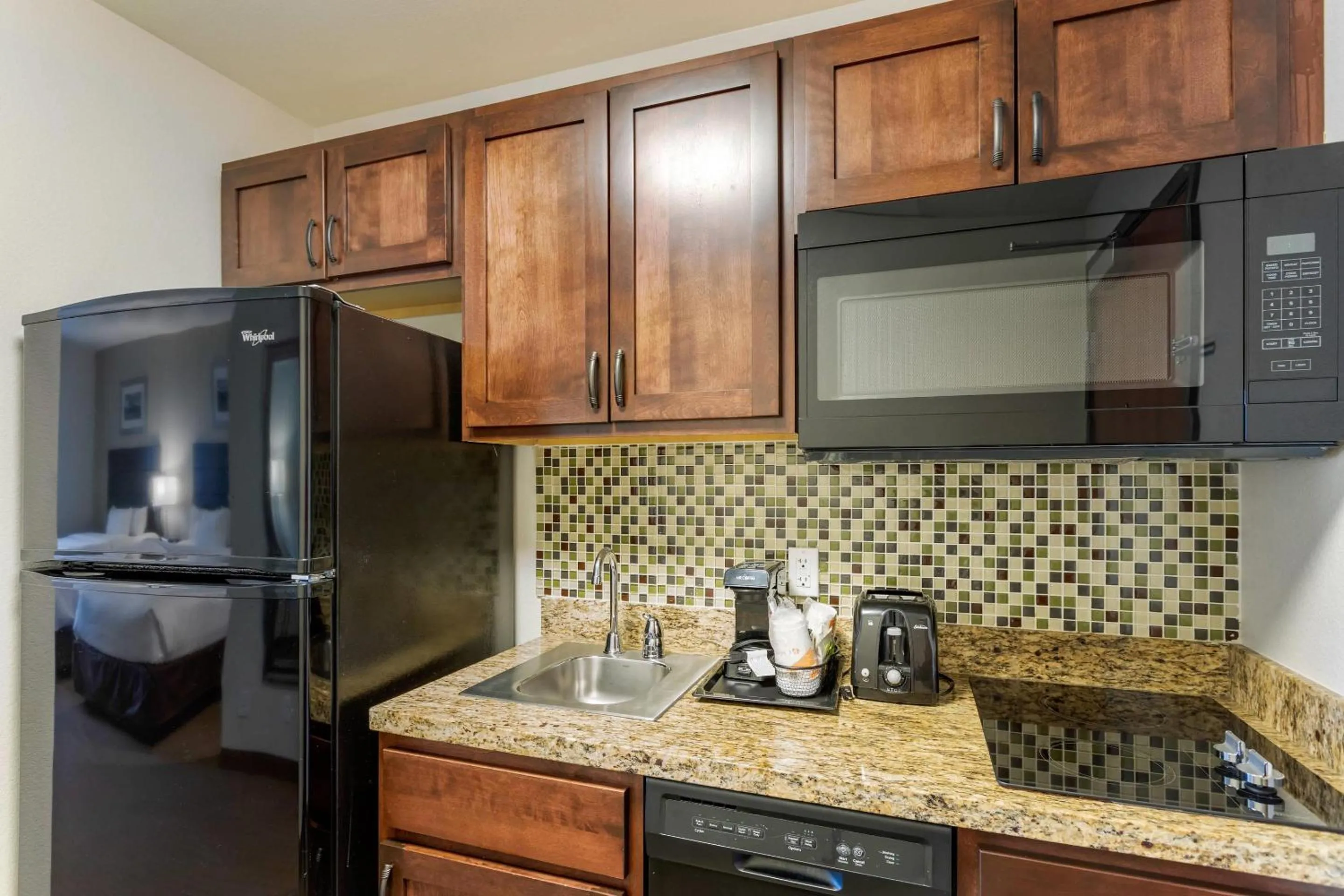 Bedroom in MainStay Suites Near Denver Downtown