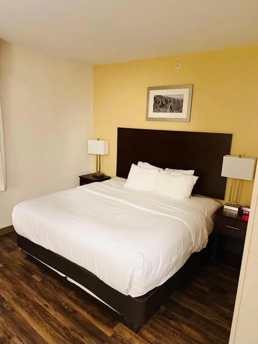 Bed in MainStay Suites Near Denver Downtown