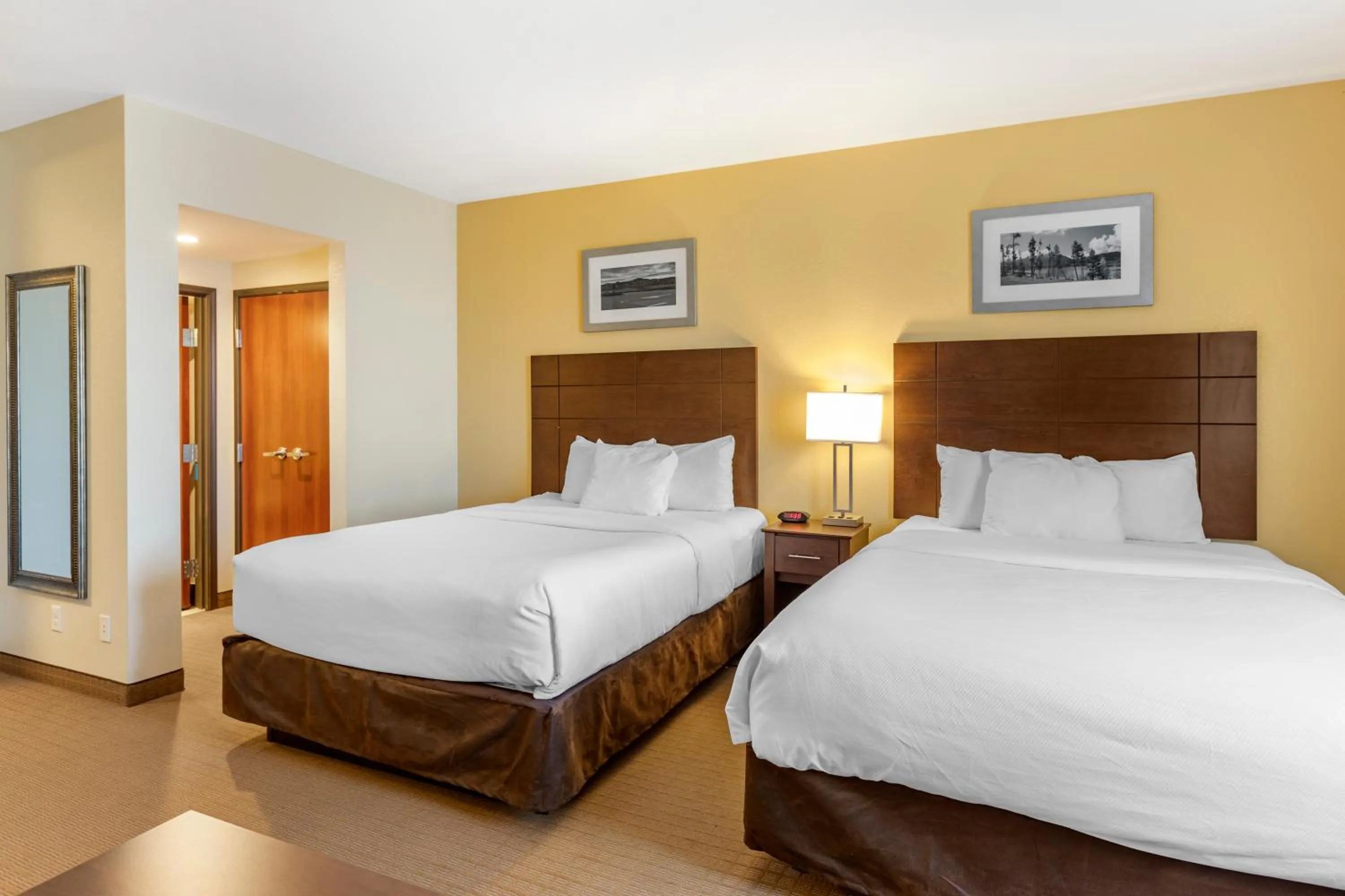 Bed in MainStay Suites Near Denver Downtown