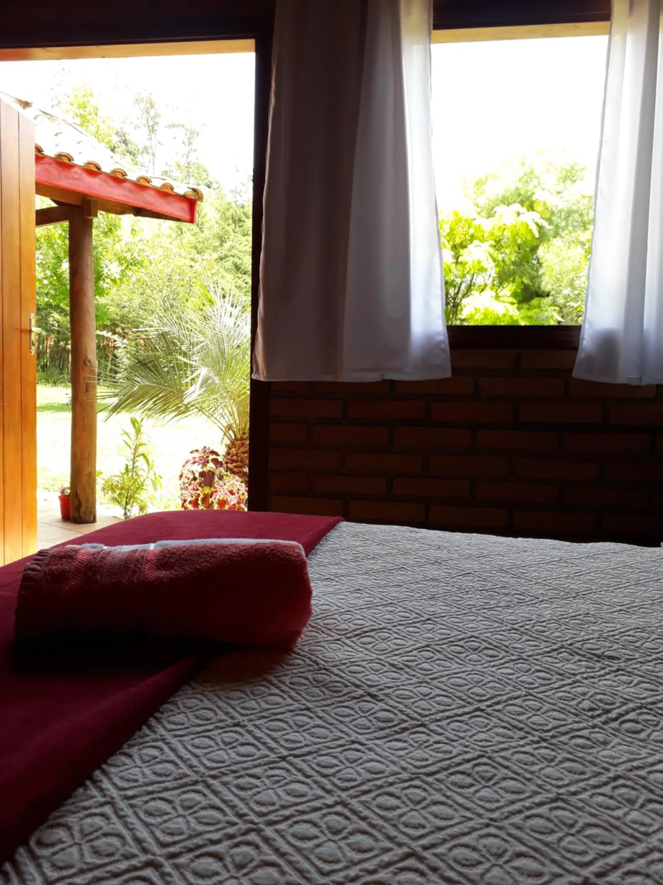 Bed in Pousada Refugio Sol e Brisa