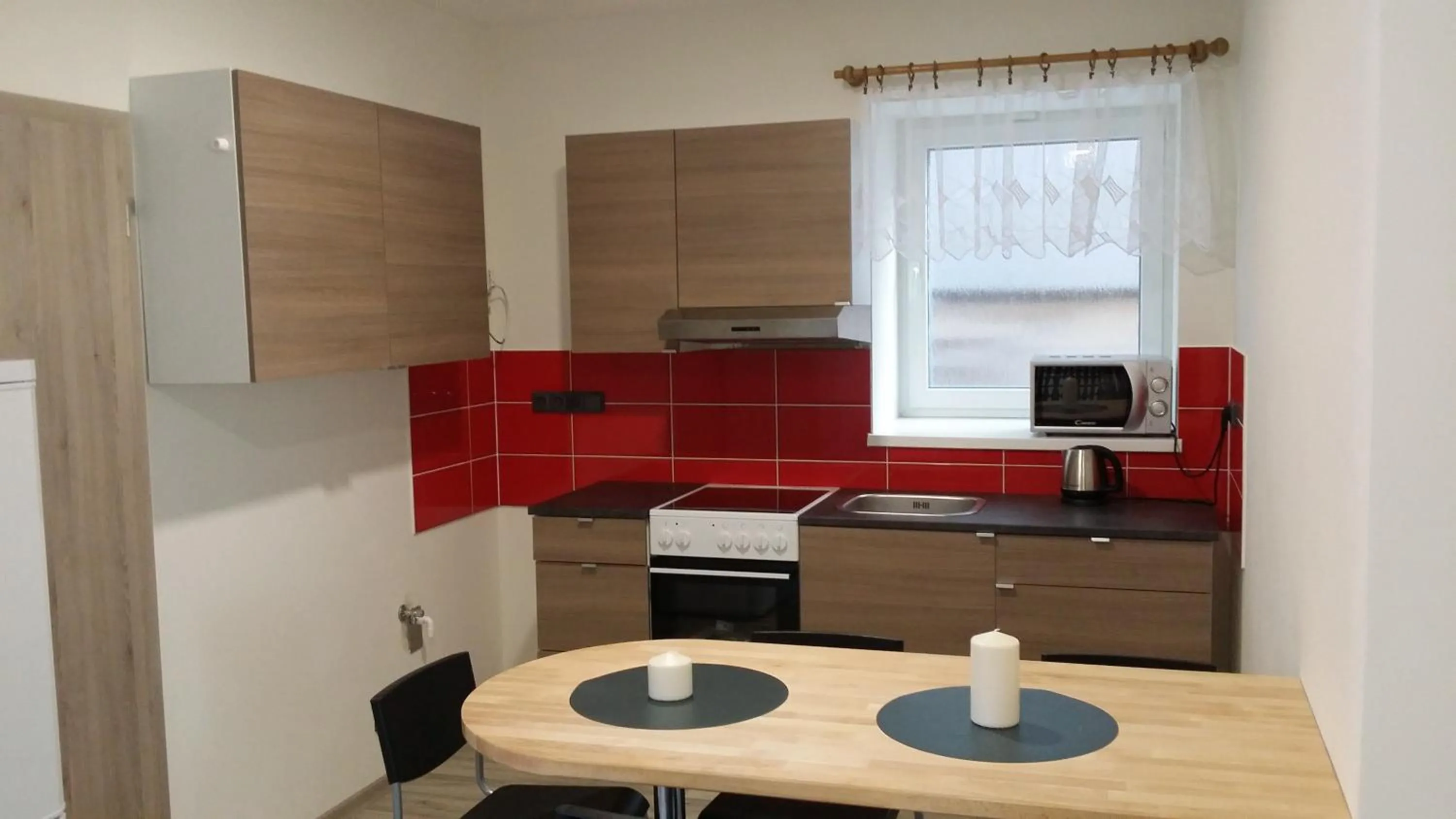 Communal lounge/ TV room in Ubytov¿ N?m?i?ky