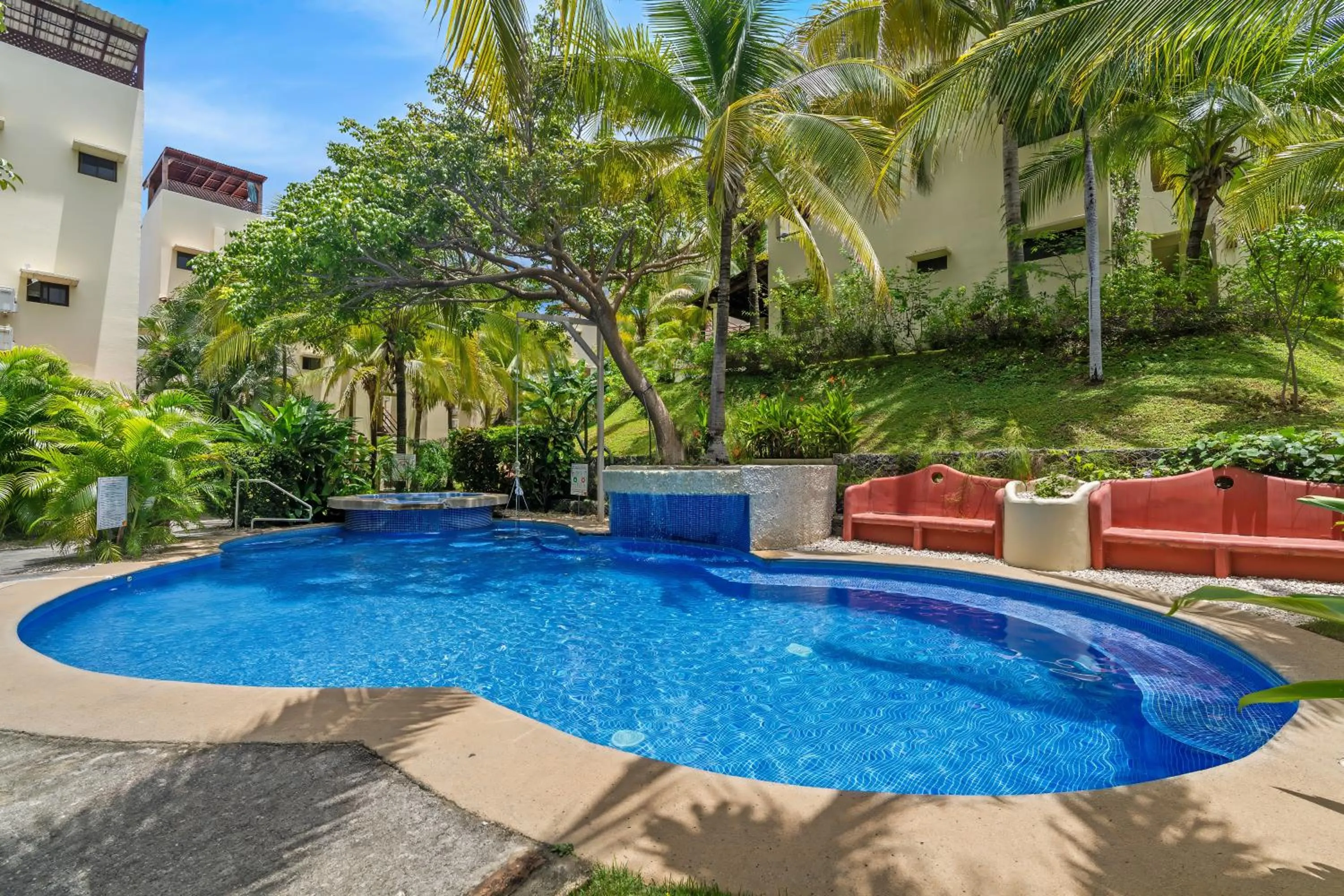 Pool view in Tropical Gardens Suites and Apartments