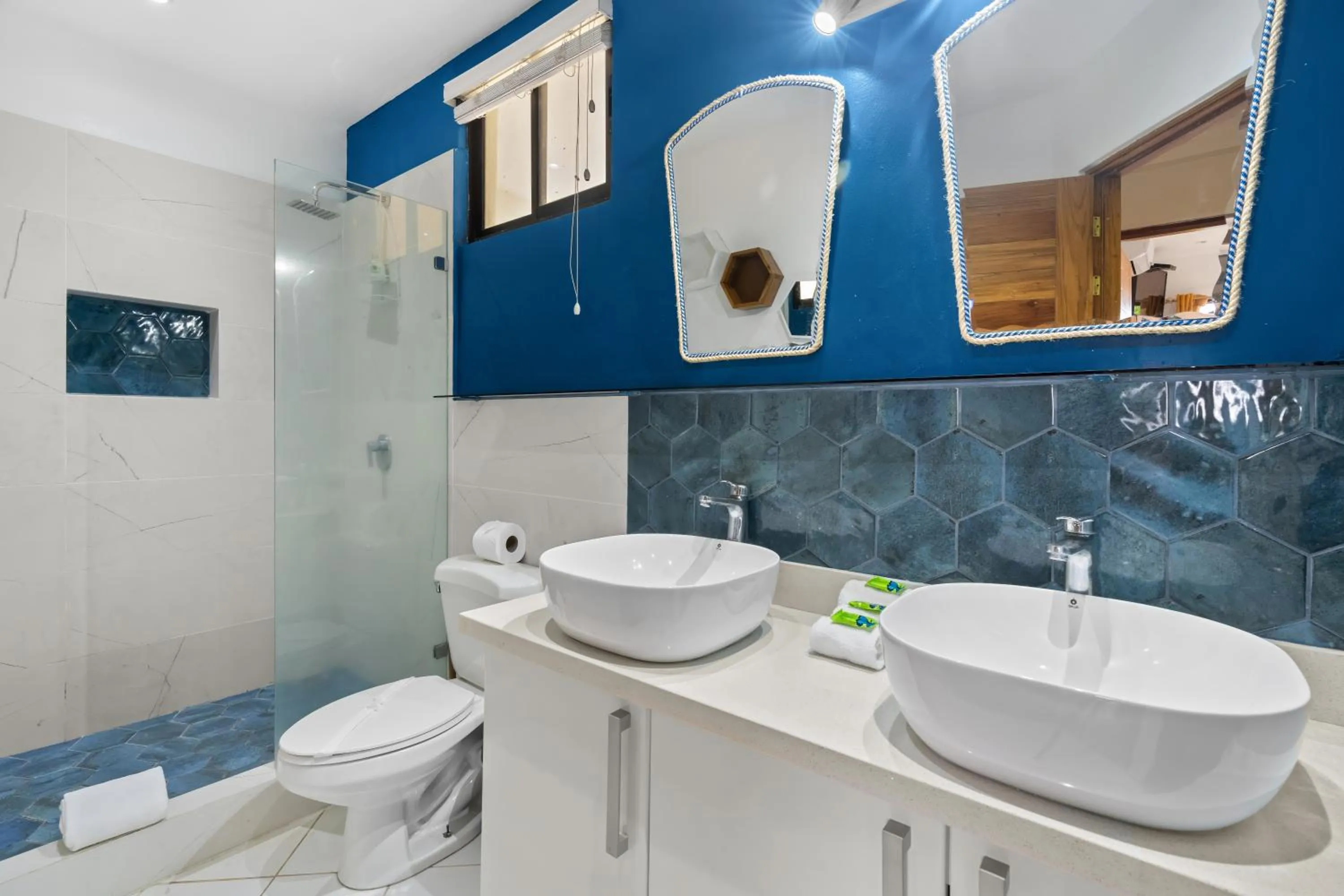 Shower in Tropical Gardens Suites and Apartments