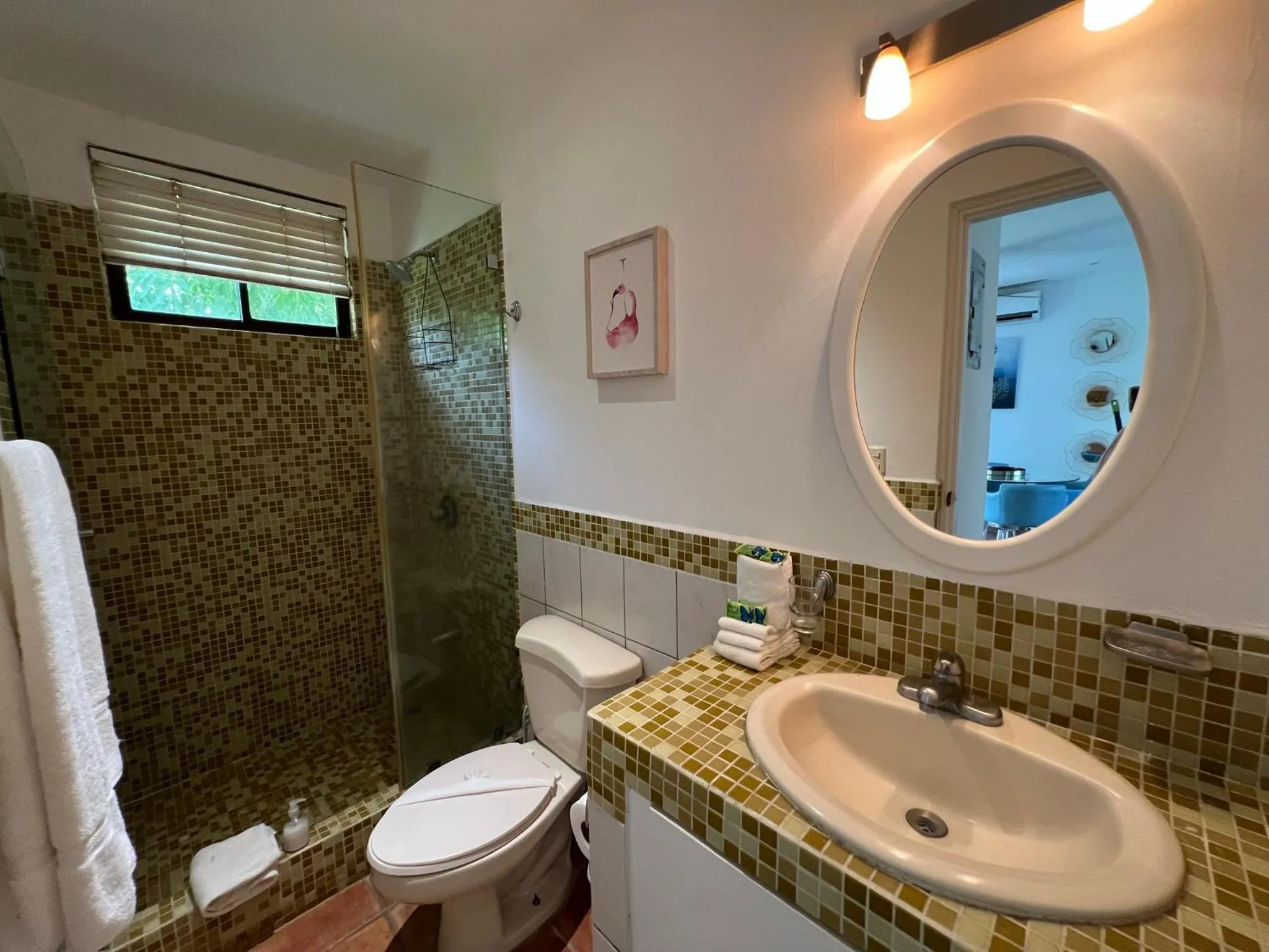 Bathroom in Tropical Gardens Suites and Apartments