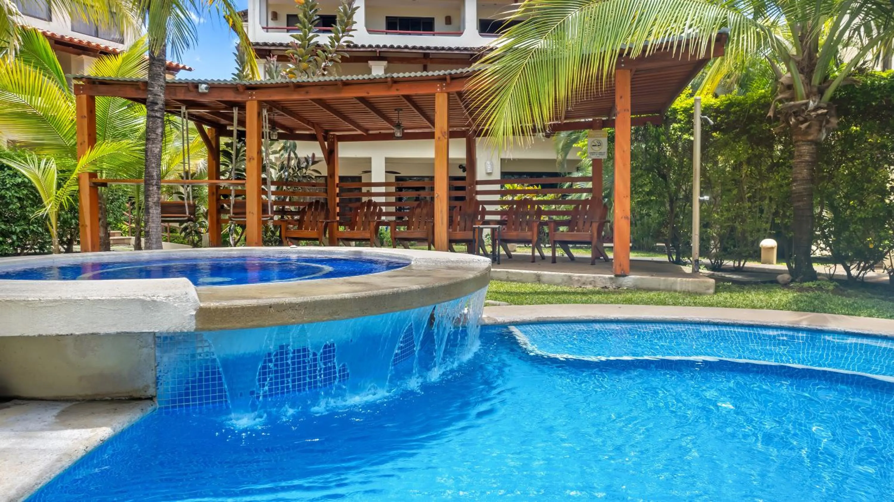 Pool view in Tropical Gardens Suites and Apartments