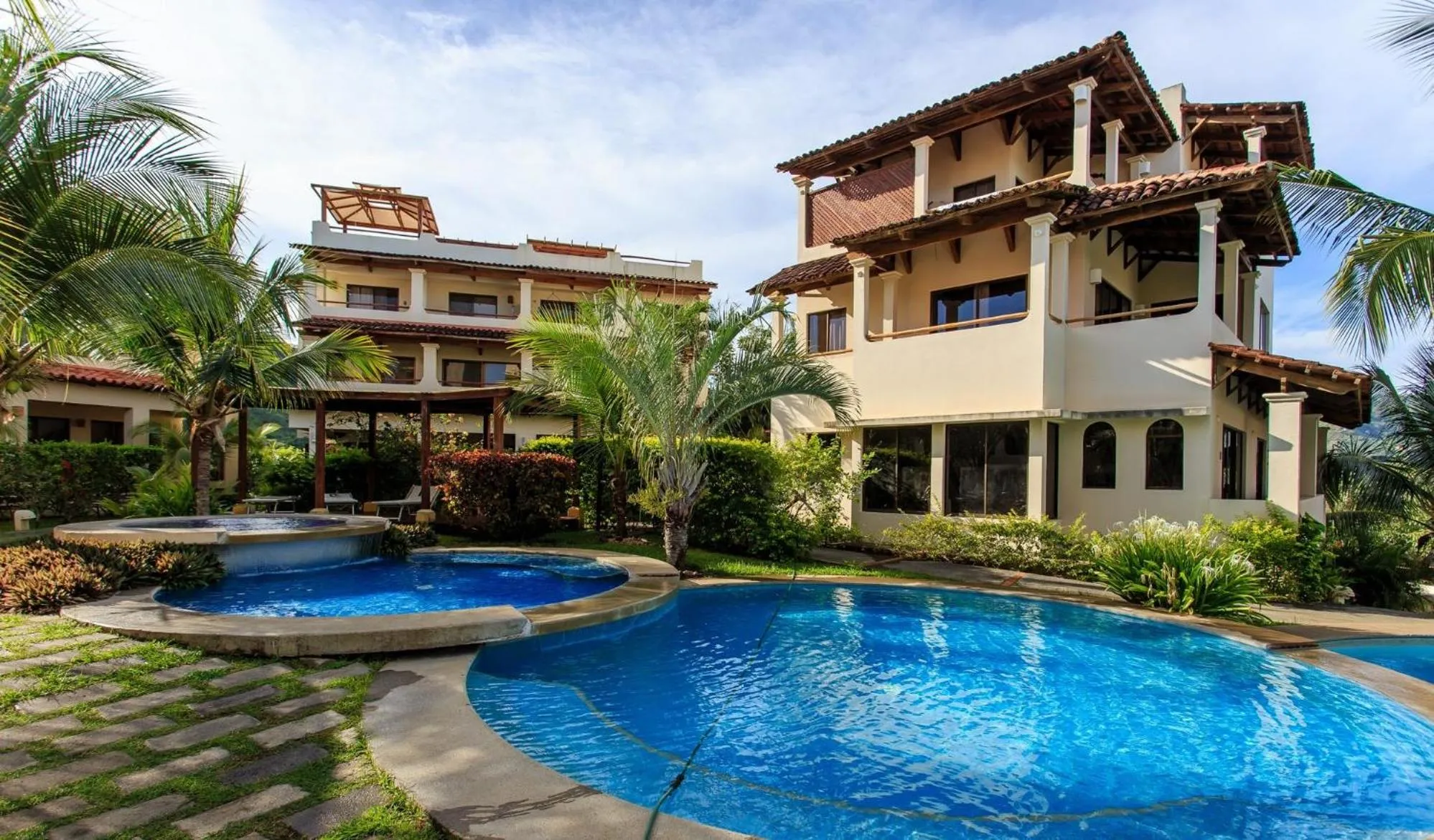 Pool view in Tropical Gardens Suites and Apartments