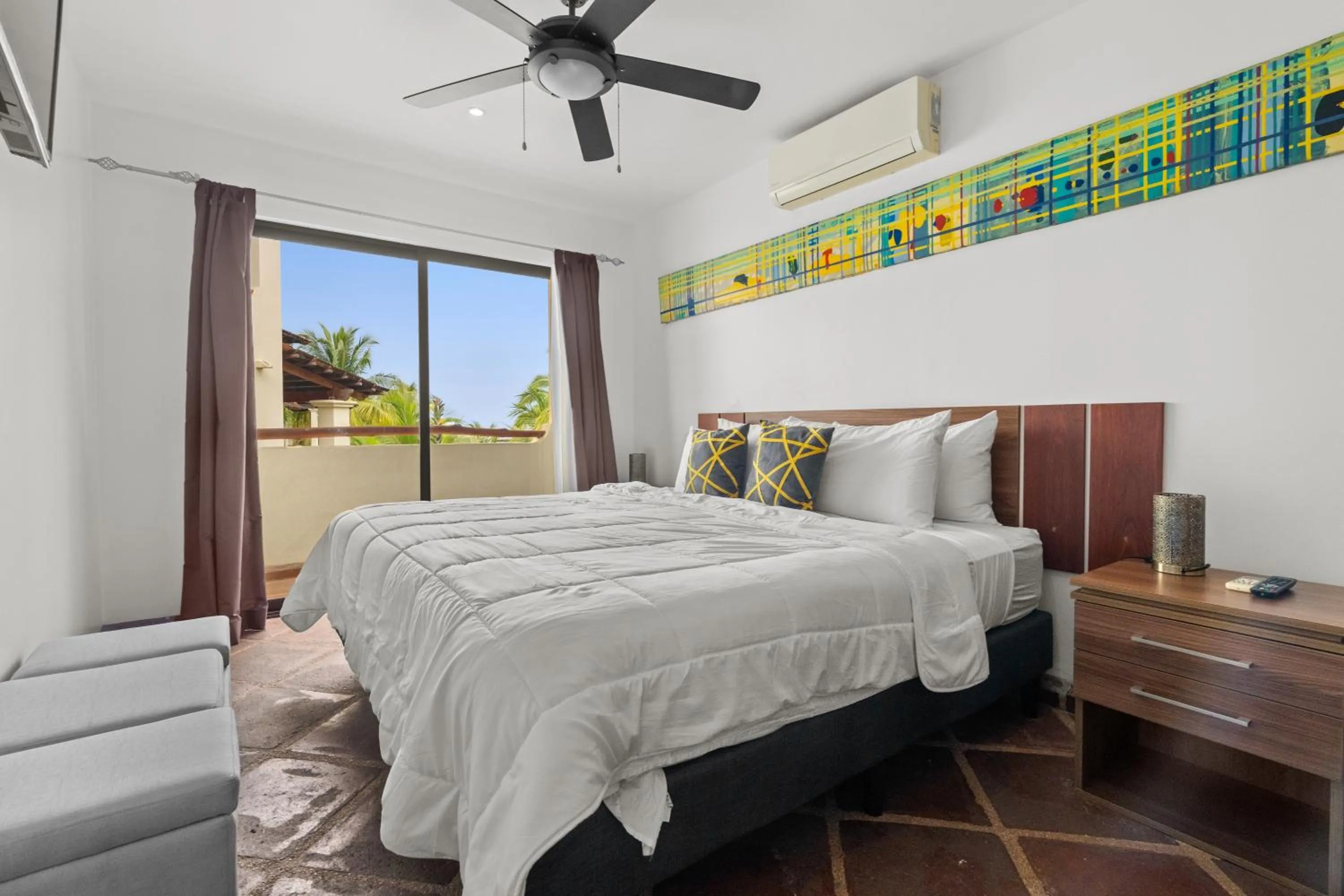 Bed in Tropical Gardens Suites and Apartments