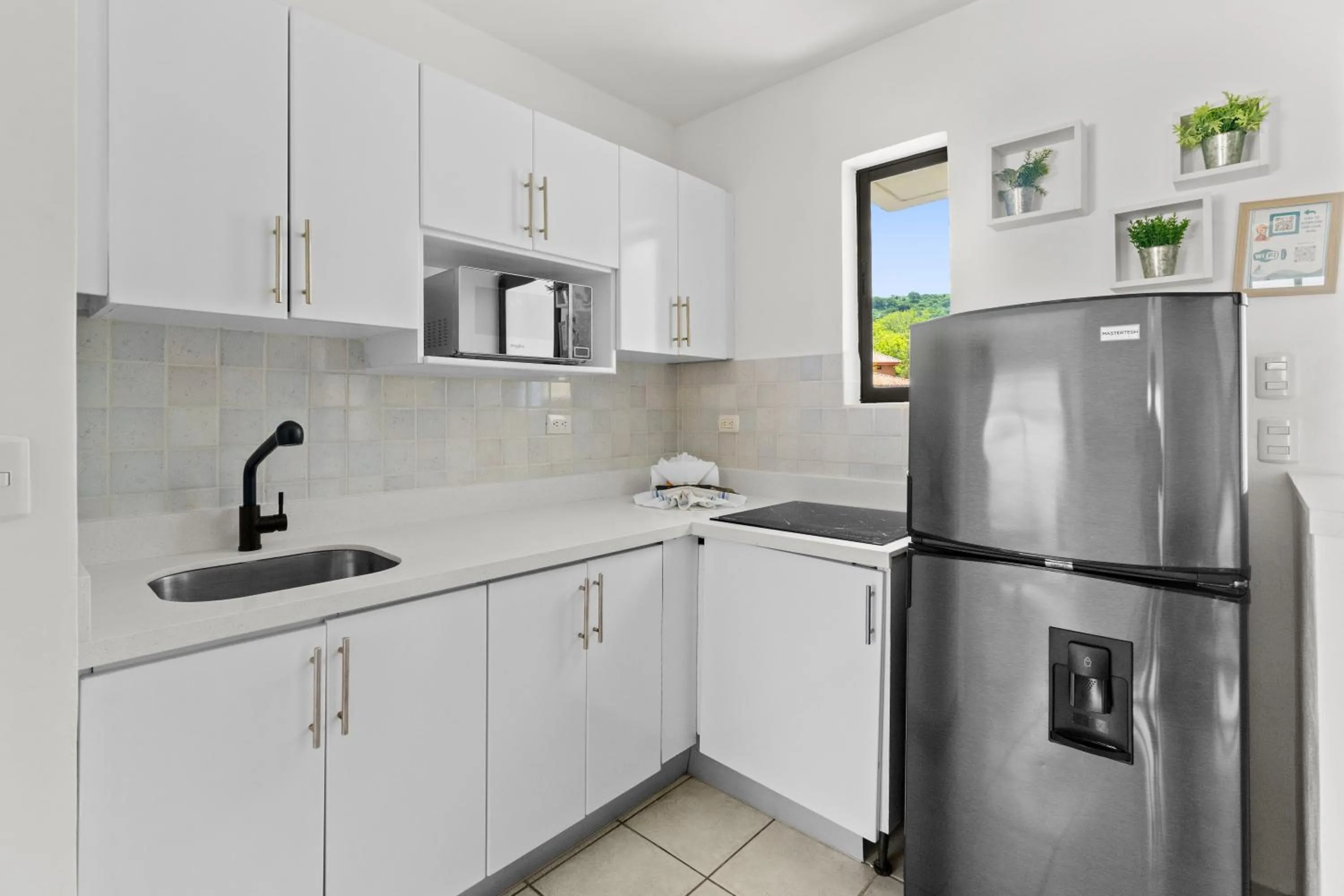 Living room in Tropical Gardens Suites and Apartments