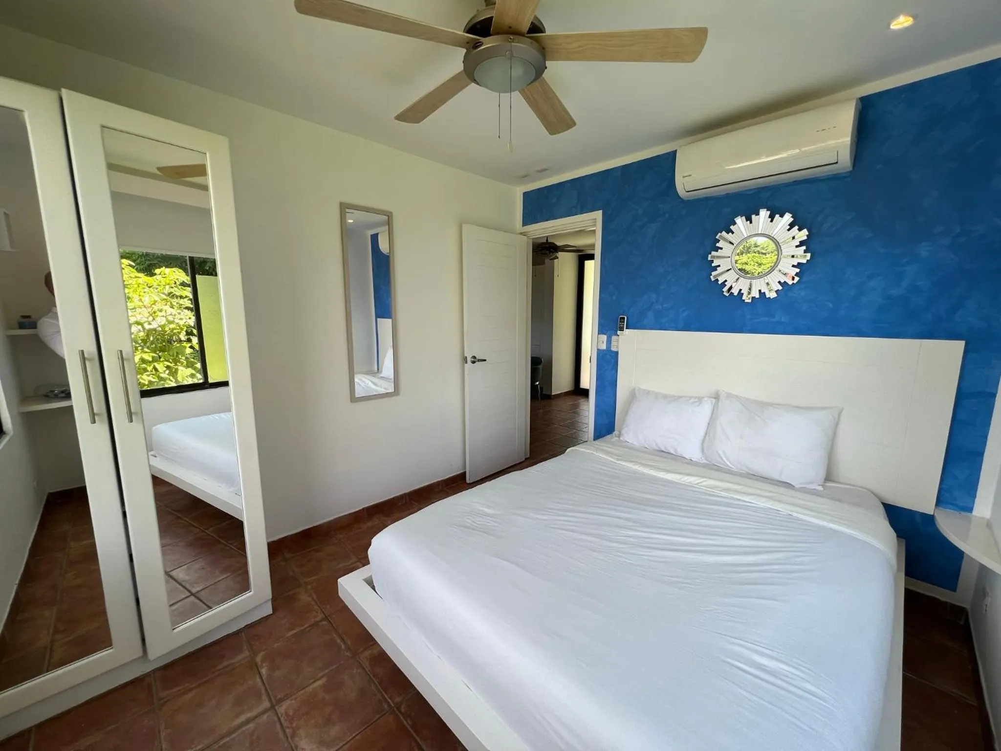Photo of the whole room, Bed in Tropical Gardens Suites and Apartments