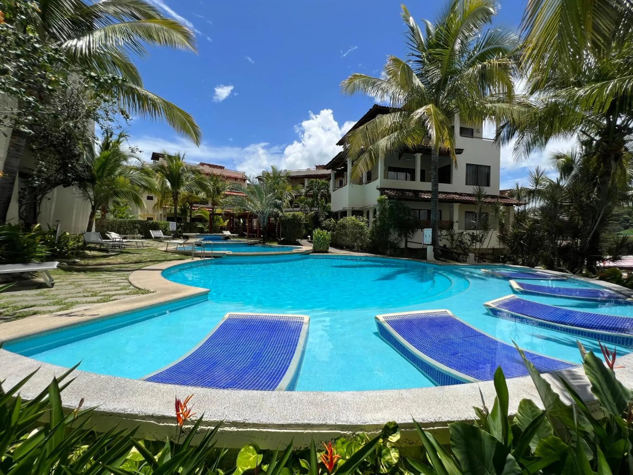 Swimming pool in Tropical Gardens Suites and Apartments