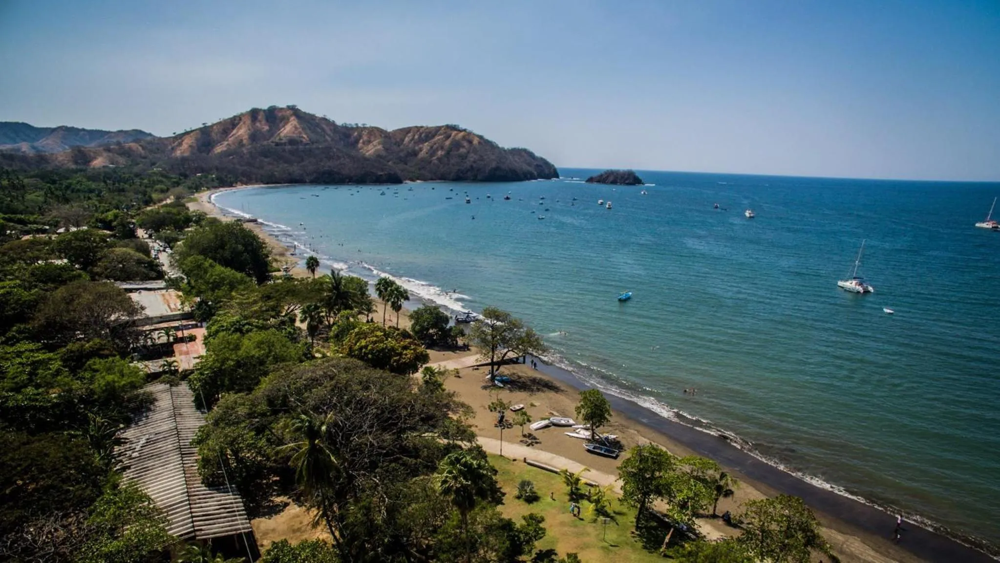 Beach in Tropical Gardens Suites and Apartments