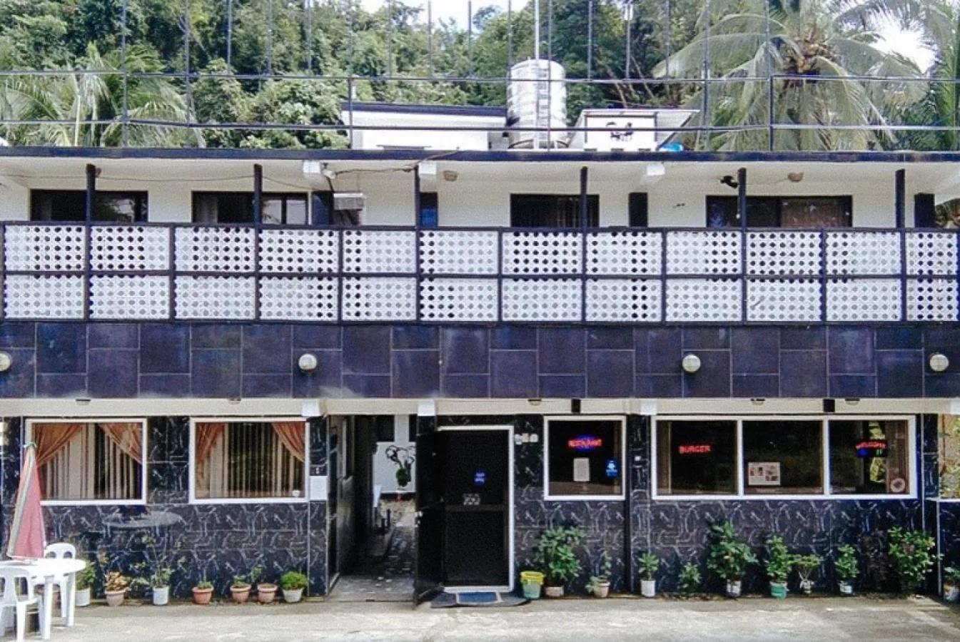 Property building in RedDoorz @ Western Highway Lodge Hotel