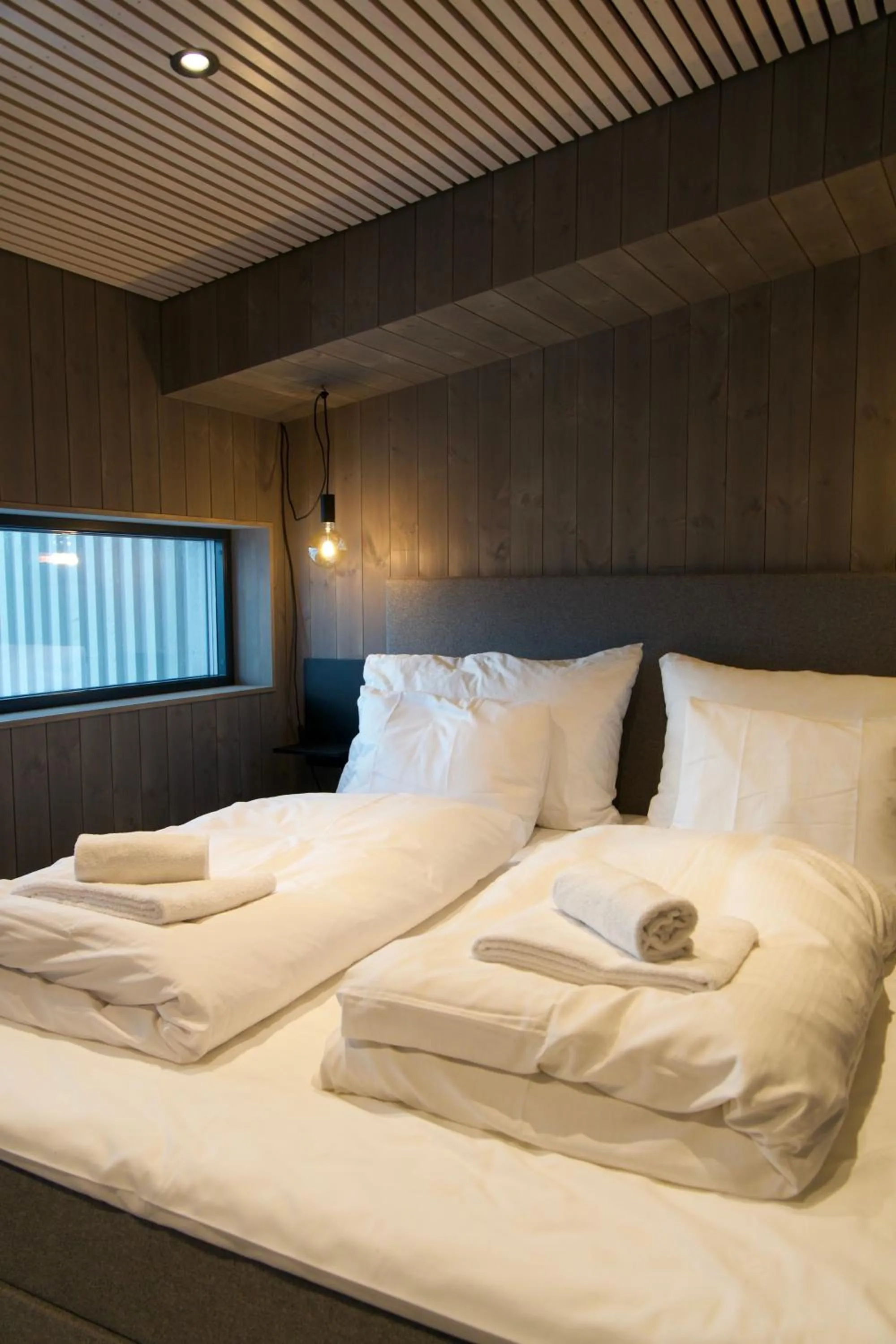 Bed in Lofoten Apartments