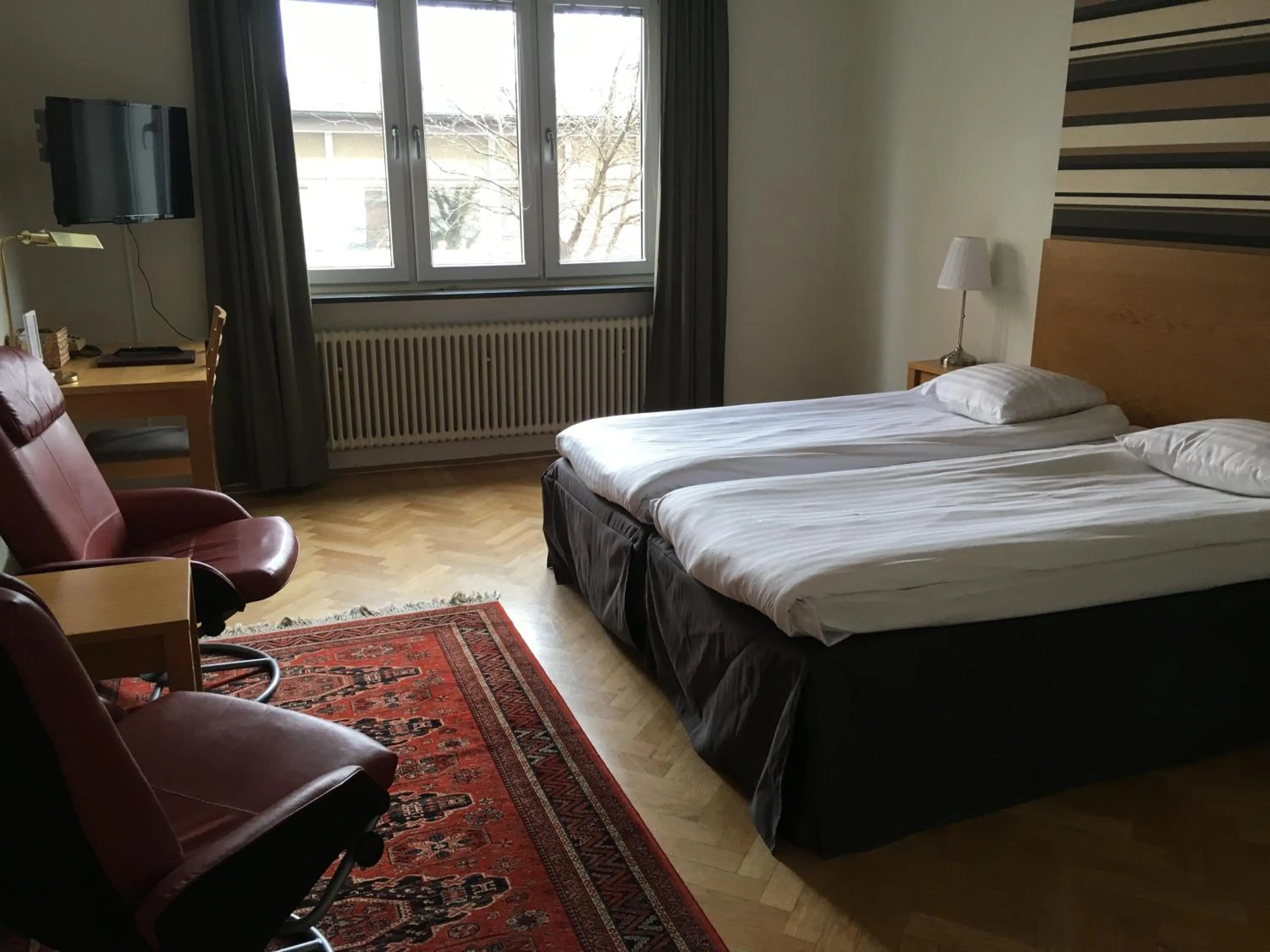 Photo of the whole room, Bed in First Hotel City Eskilstuna