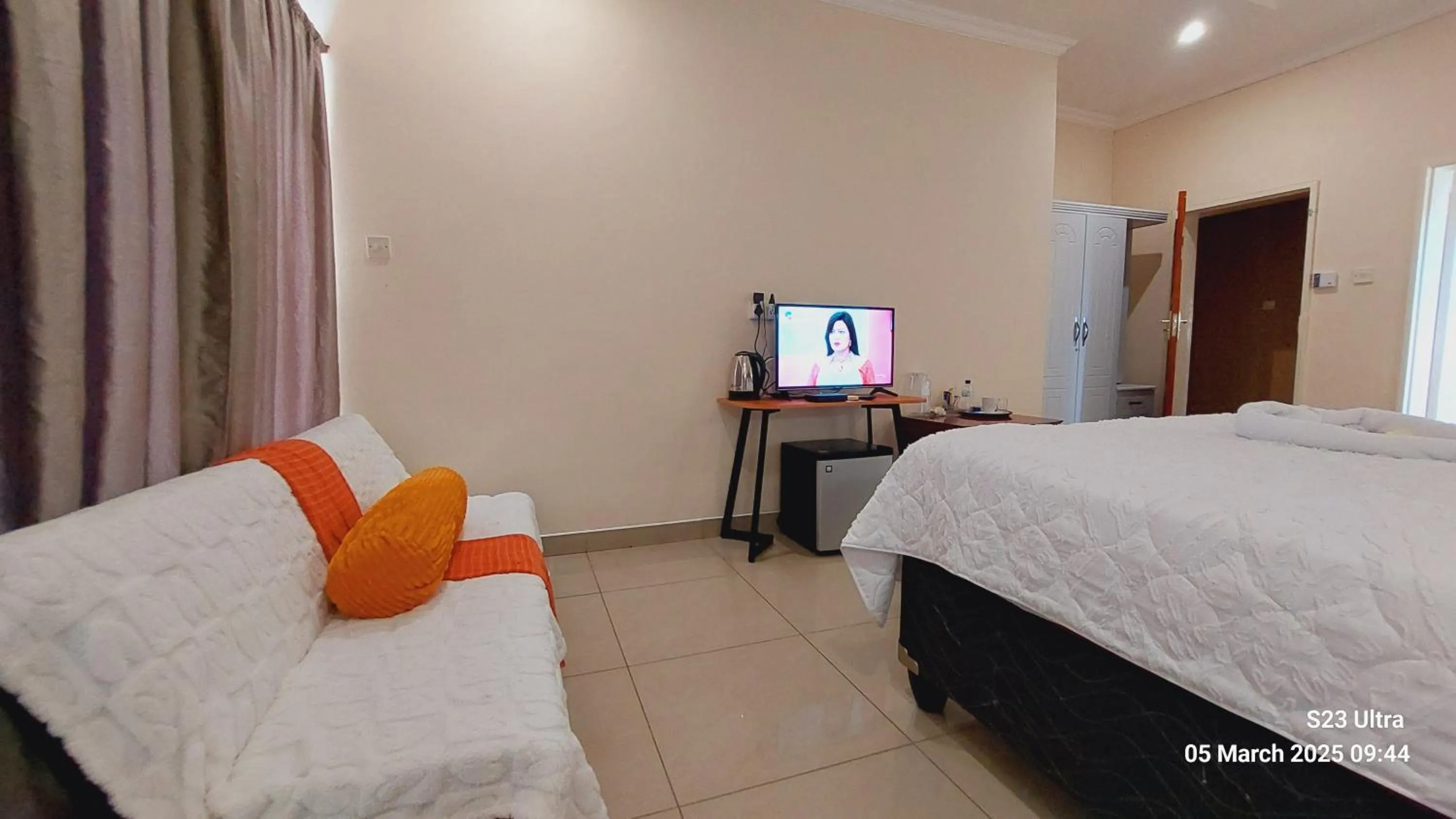 Lounge or bar, Bed in Comfort Palace Guest House Kasane