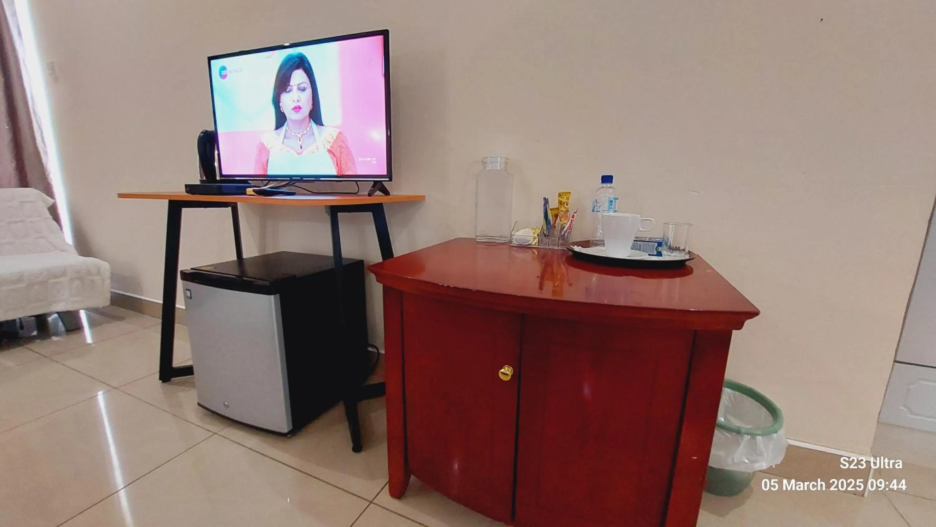 Communal lounge/ TV room in Comfort Palace Guest House Kasane