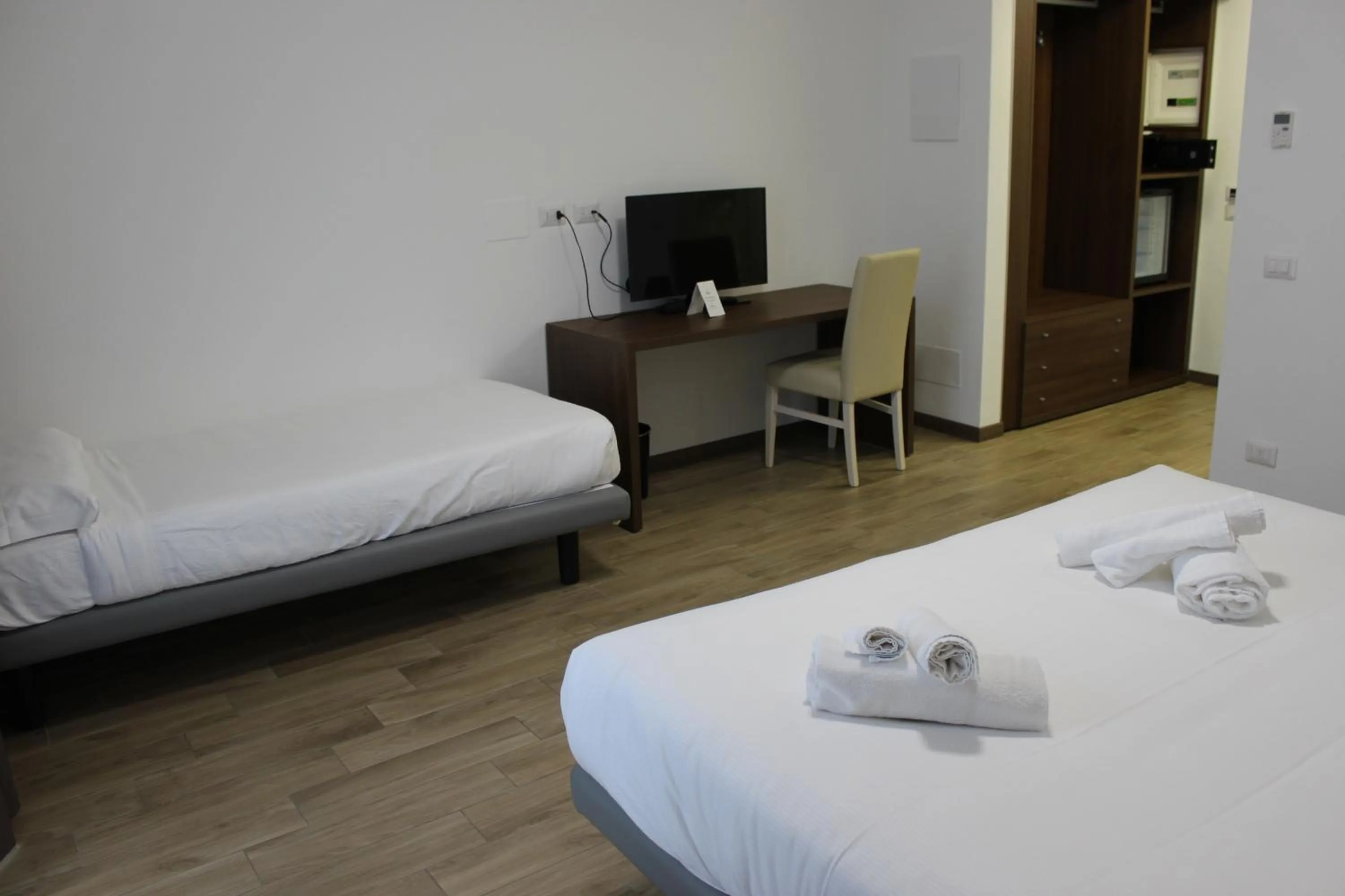 Bed in Hotel Bocciolo