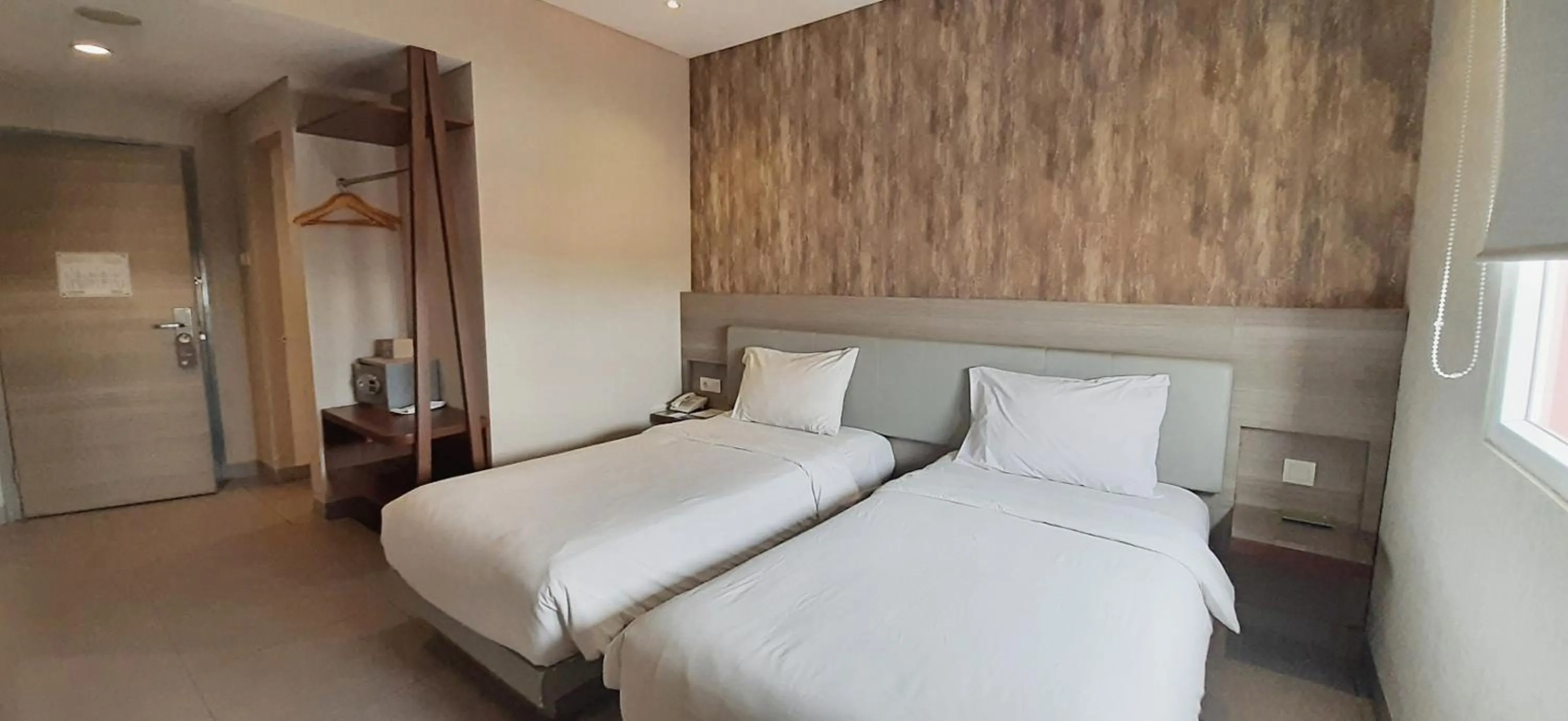 Bed in Lynn Hotel Serang