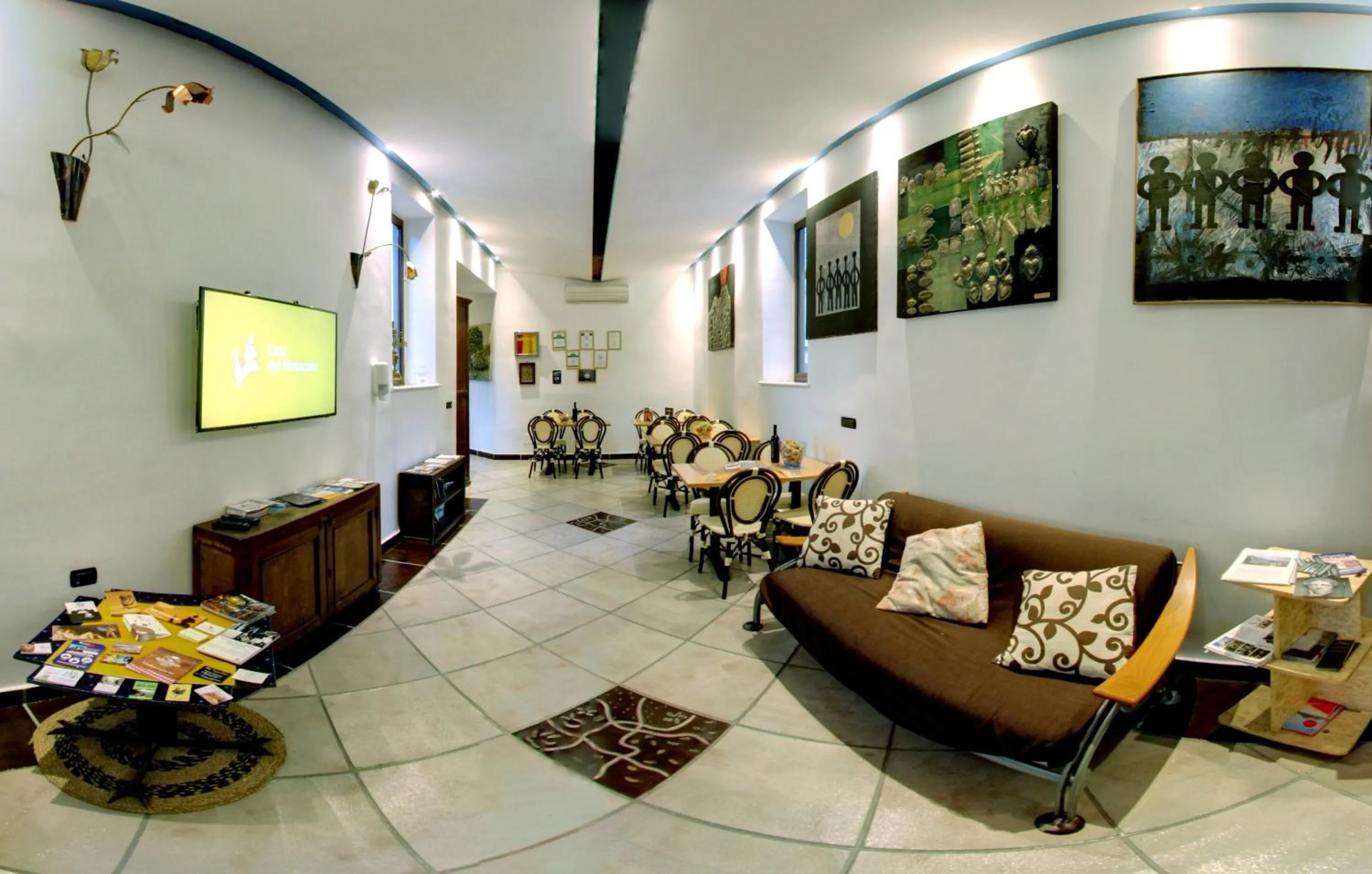 Communal lounge/ TV room in Casa del Monacone