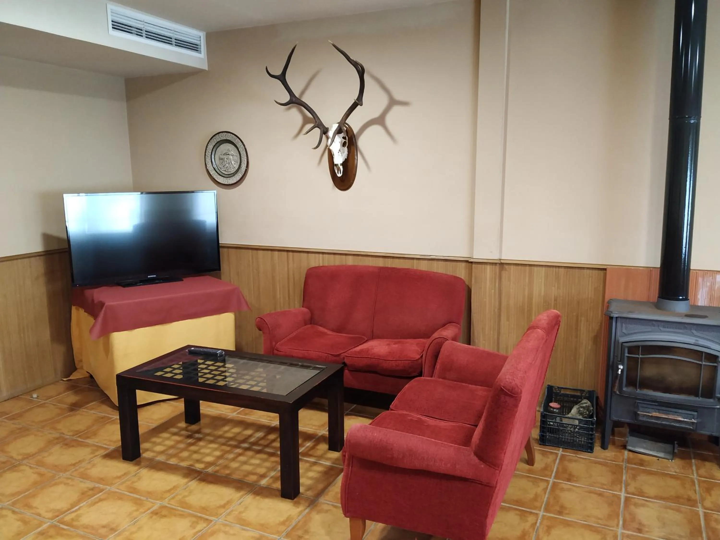 Communal lounge/ TV room in Hotel Sierra de Andujar